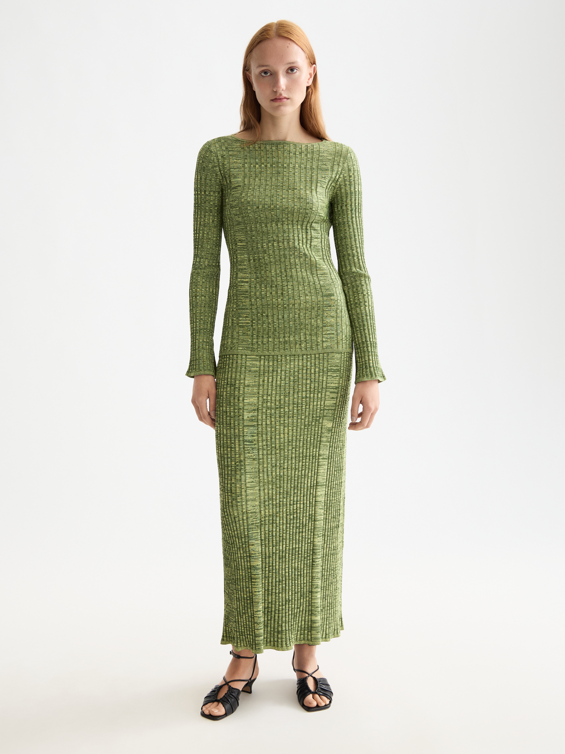 Ribbed knitted maxi skirt by Scotch & Soda, showcasing a close-up of the textured fabric and high-waisted design.