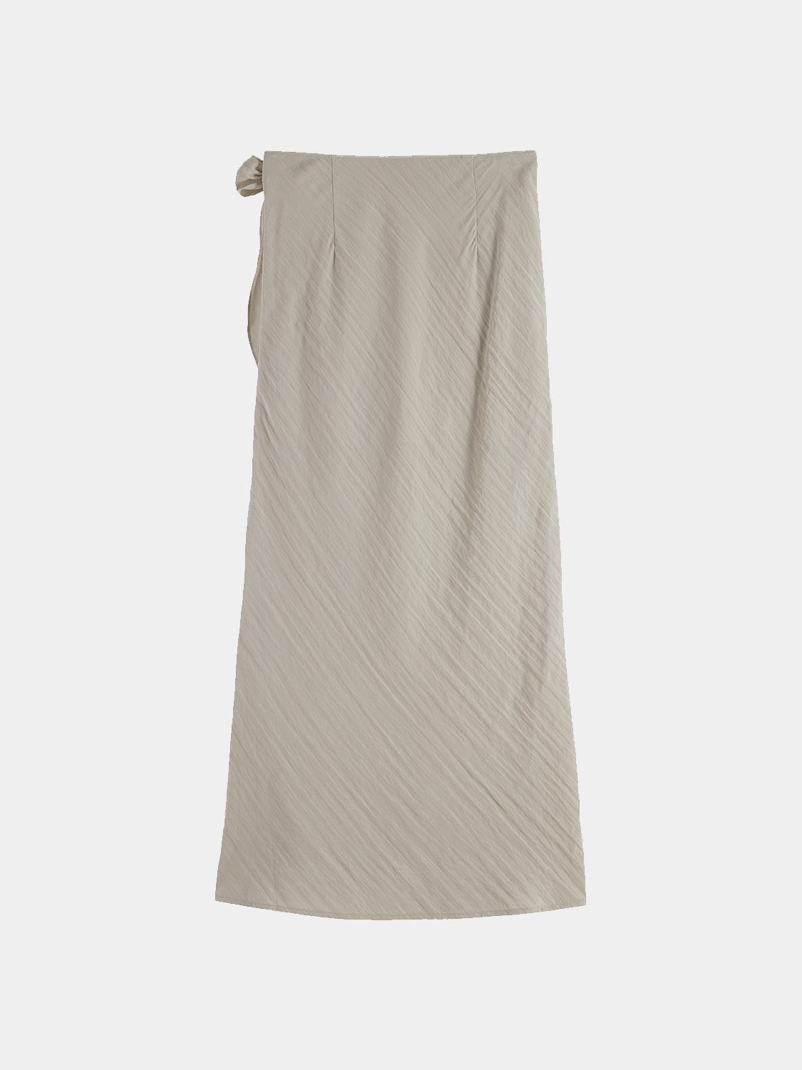 Black Scotch & Soda midi wrap skirt with a tied waist and flowing fabric, styled with a subtle pattern.