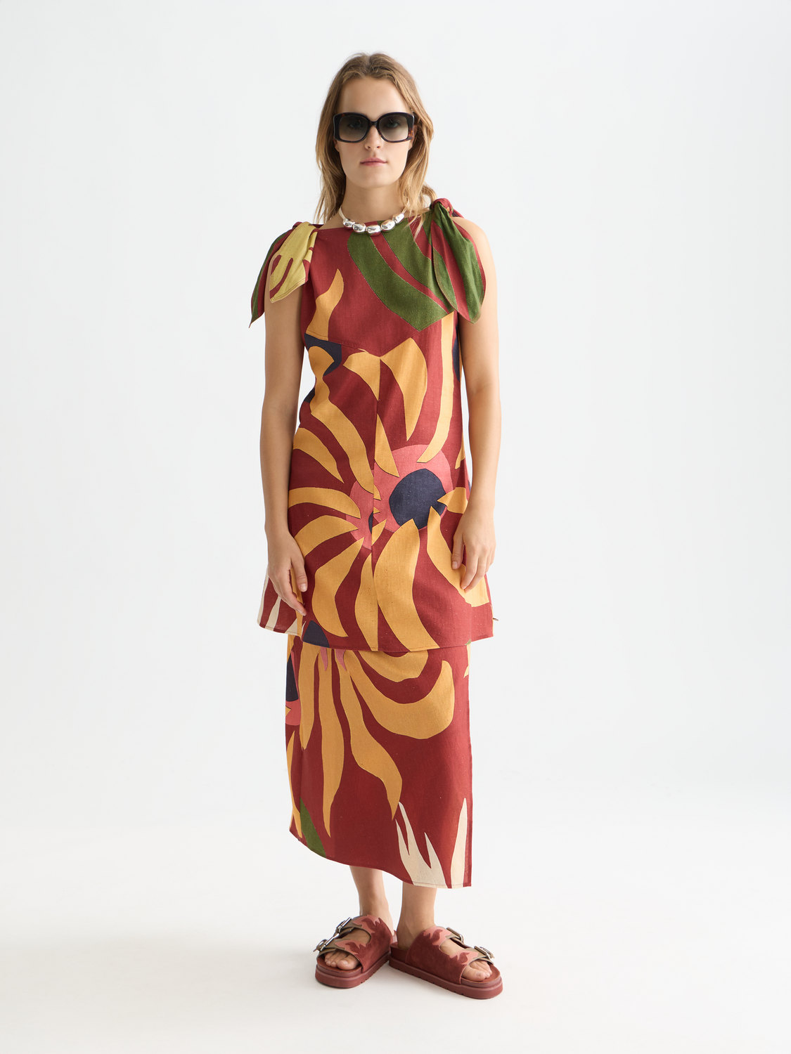 Linen wrap skirt by Scotch & Soda featuring a neutral color, tied waist, and flowing design perfect for casual wear.