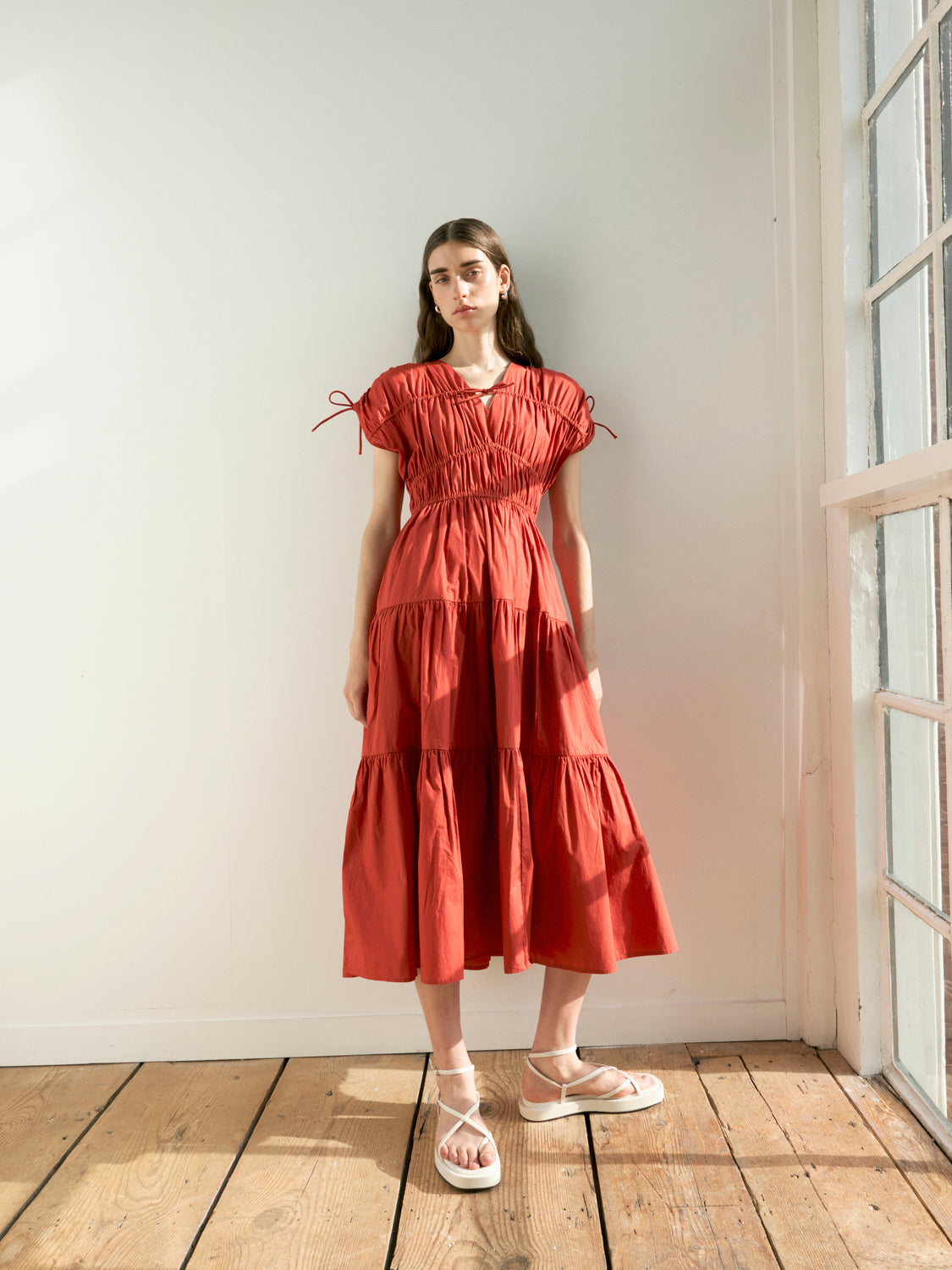 Gathered midi dress by Scotch & Soda, featuring a flowy silhouette and textured fabric, shown on a model.