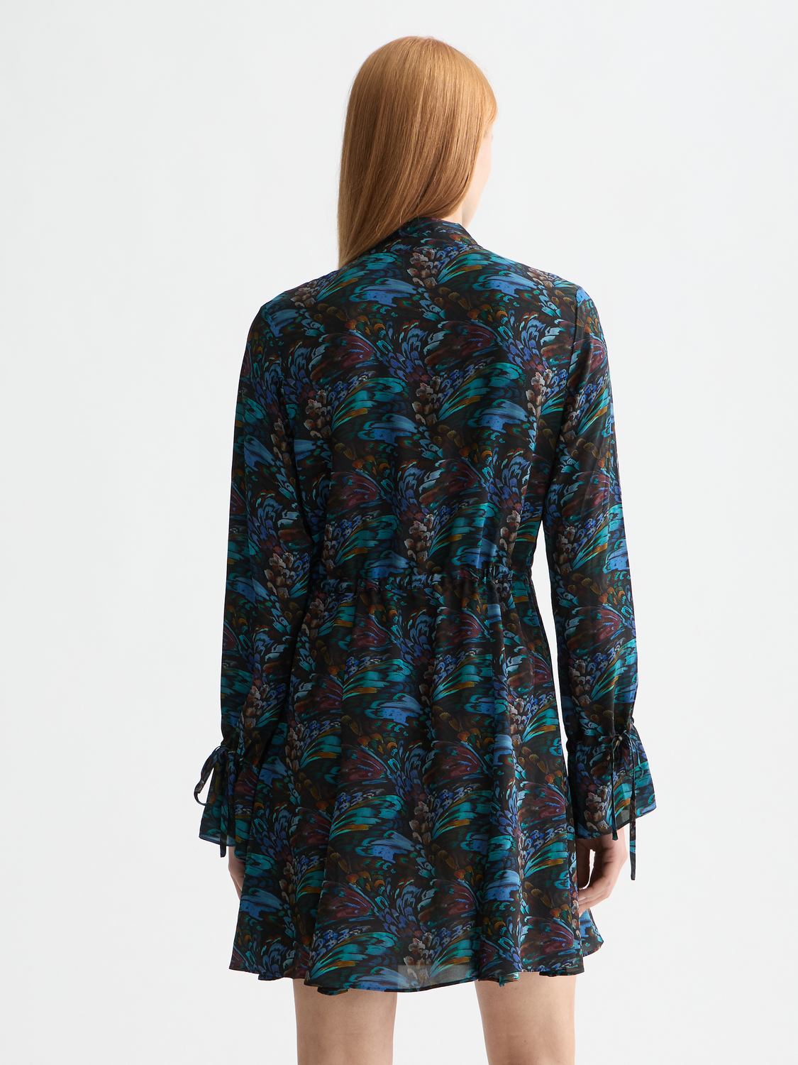 Printed mini dress by Scotch & Soda featuring a vibrant floral pattern and a fitted silhouette.
