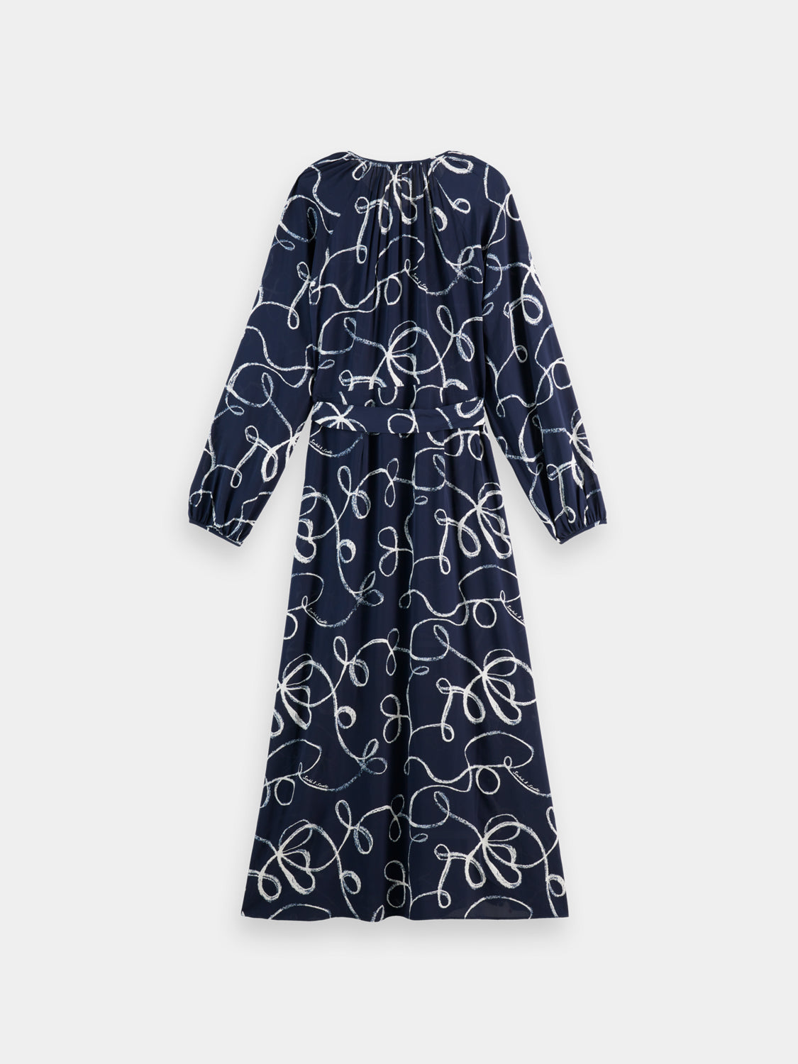 SCOTCH & SODA midi wrap dress showing a stylish, patterned design with long sleeves and a waist-tie detail.