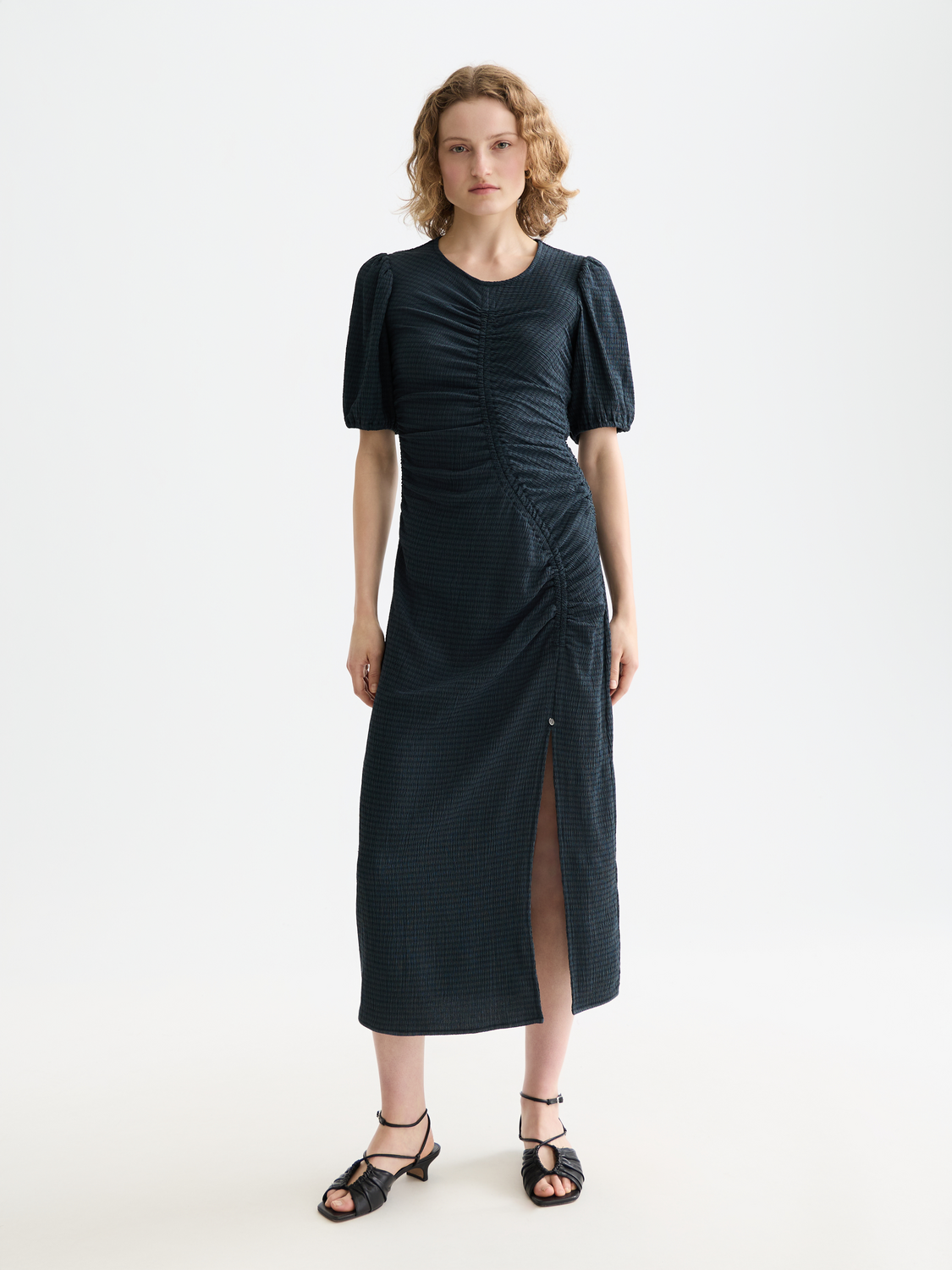 Scotch & Soda gathered midi dress featuring a flowy silhouette and elegant design, shown in a natural fabric with a fitted waist.