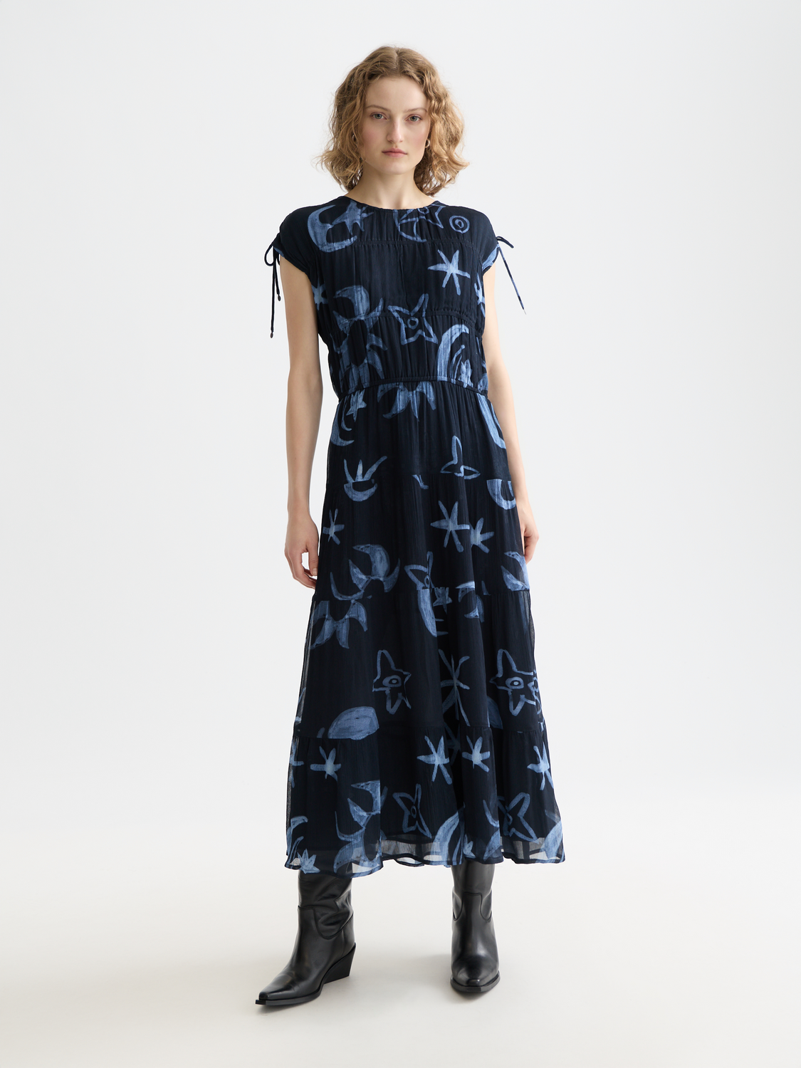 Gathered midi dress by Scotch & Soda featuring a flowy silhouette and stylish design, shown in a front view.