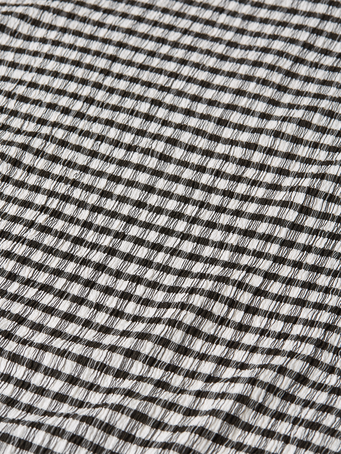 Scotch & Soda gingham midi dress with short sleeves and a fitted waist, featuring a classic black and white checkered pattern.