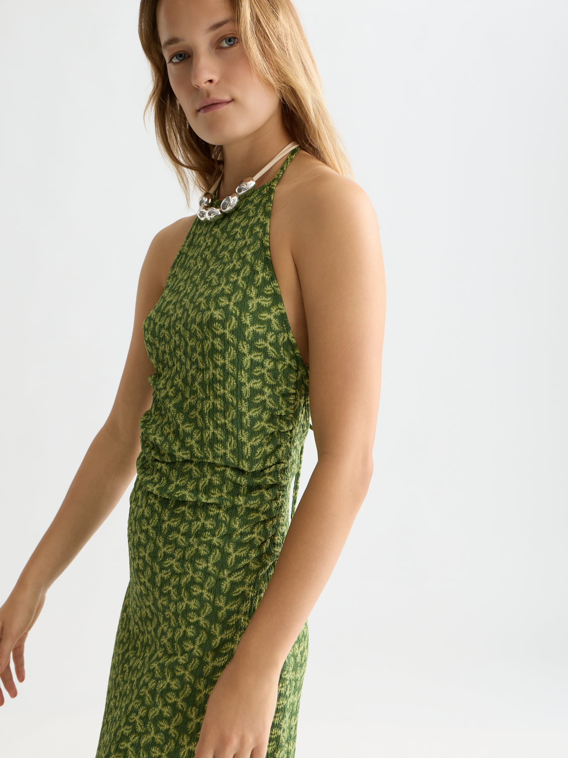 Open back midi dress from Scotch & Soda featuring a flowy silhouette and stylish design, perfect for casual or semi-formal occasions.