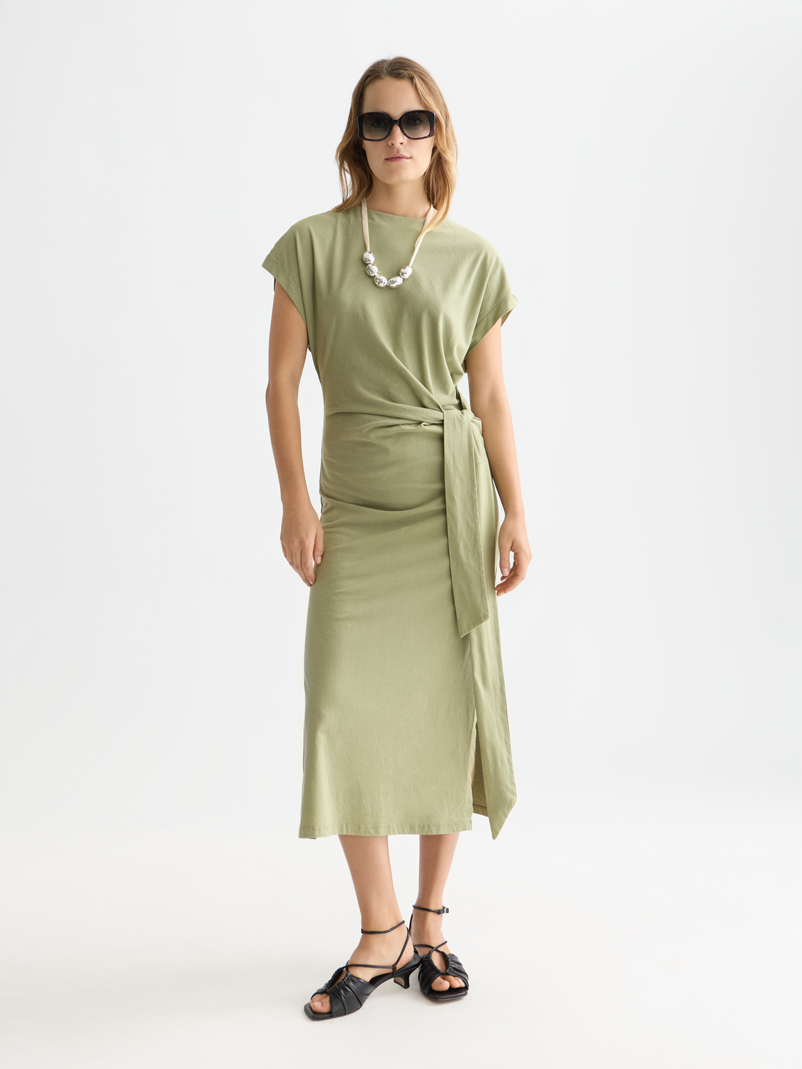 Knotted midi dress from Scotch & Soda featuring a stylish design, lightweight fabric, and a flattering length perfect for casual or dressy wear.