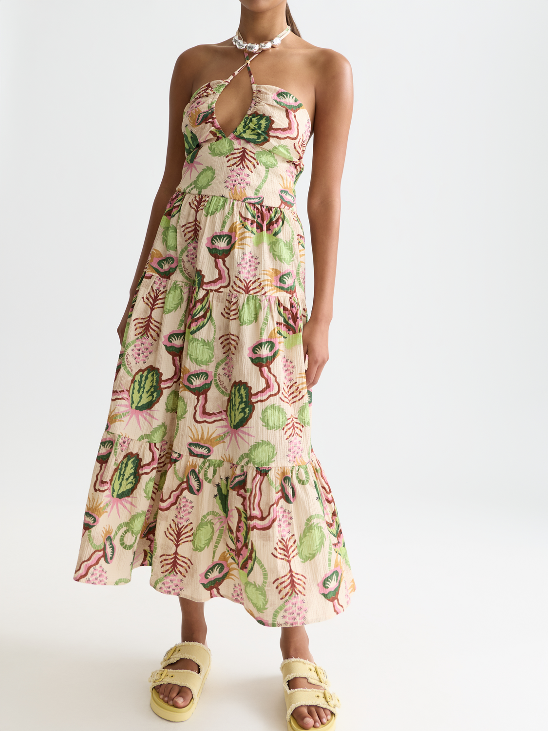 Seersucker midi dress by Scotch & Soda featuring a classic striped pattern and a relaxed fit, displayed on a model.