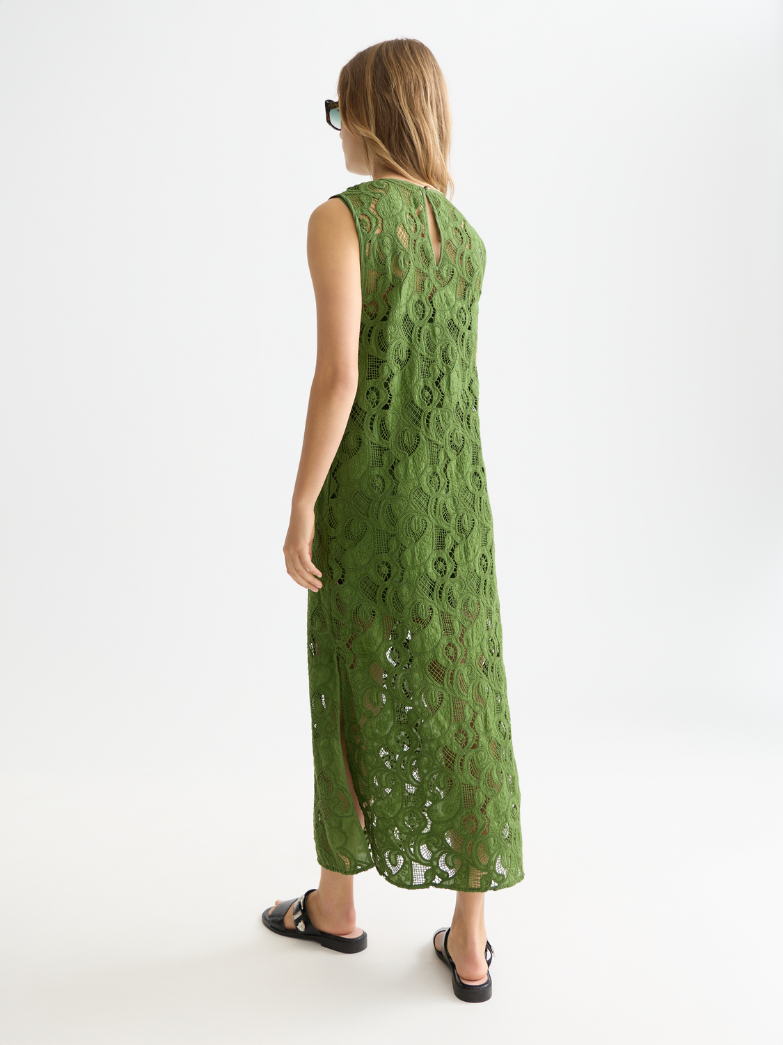 Black embroidered midi dress by Scotch & Soda featuring intricate embroidery and a flowing silhouette.