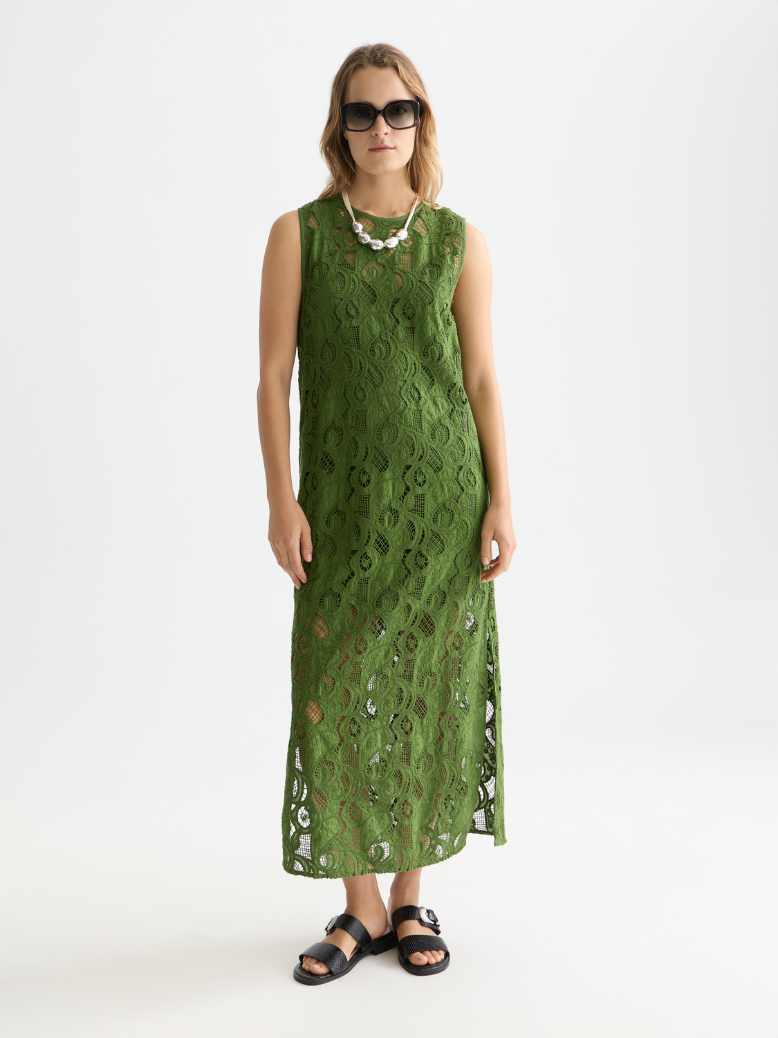 Embroidered midi dress by Scotch & Soda featuring floral embroidery, flowing fabric, and a stylish silhouette.