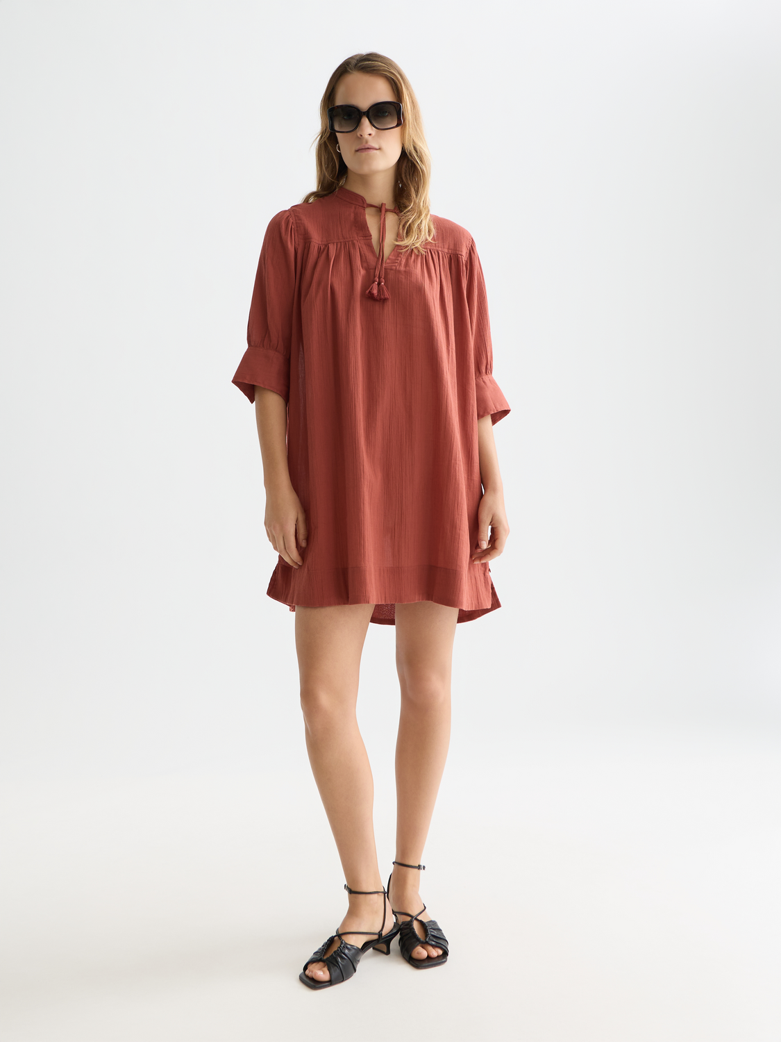 Mini gathered sleeve dress by Scotch & Soda, featuring a stylish design with gathered sleeves and a fitted silhouette.