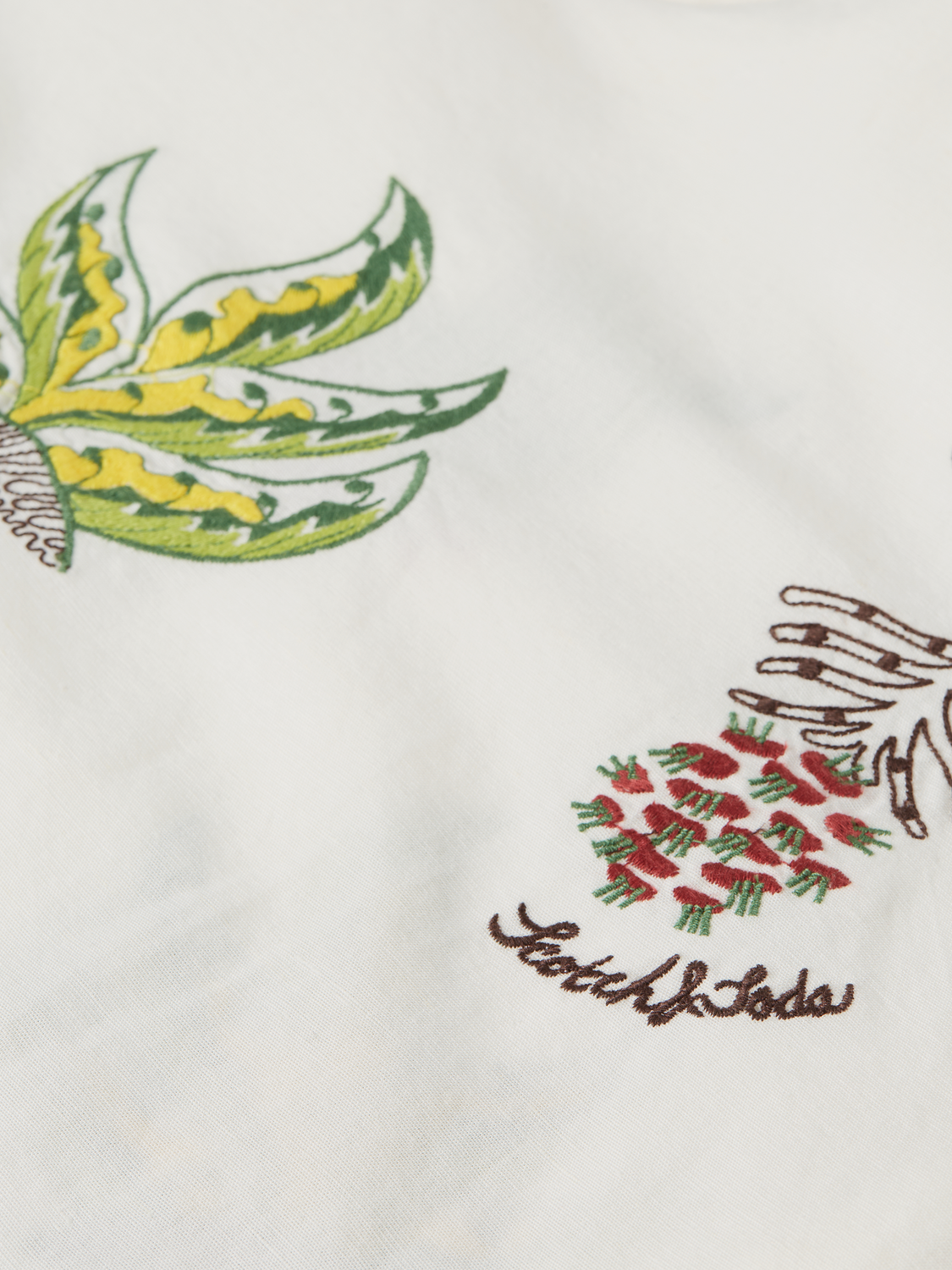 Embroidered mini dress by Scotch & Soda featuring intricate floral embroidery and a stylish fit.