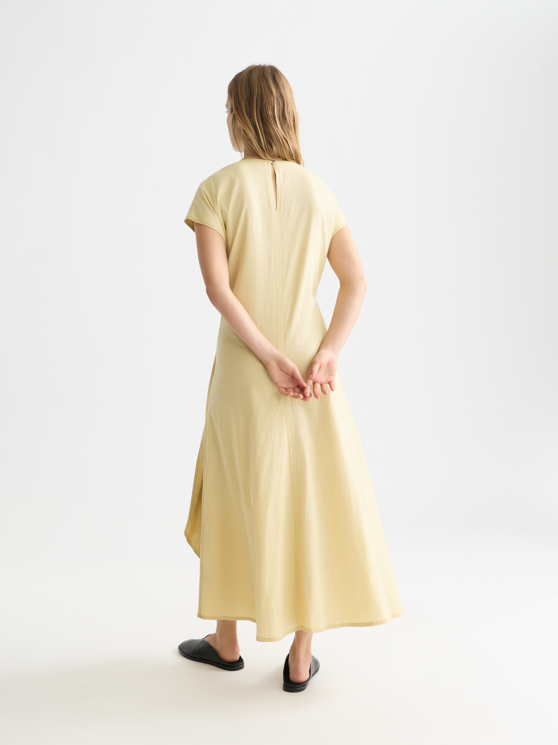 Linen-blend tie dress by Scotch & Soda featuring a relaxed fit, waist tie, and midi length in a neutral color.
