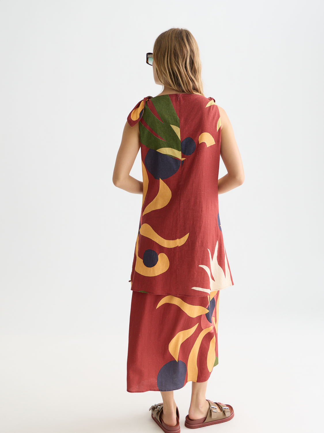 Printed mini dress from SCOTCH & SODA featuring a vibrant pattern and lightweight fabric, perfect for casual or summer wear.