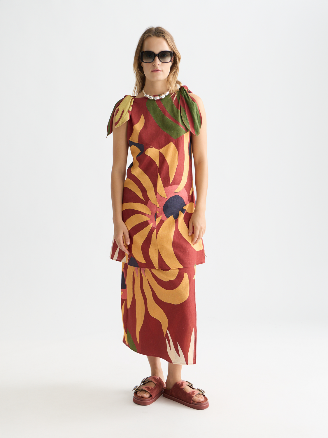Printed mini dress from SCOTCH & SODA featuring a vibrant floral pattern and fitted silhouette.