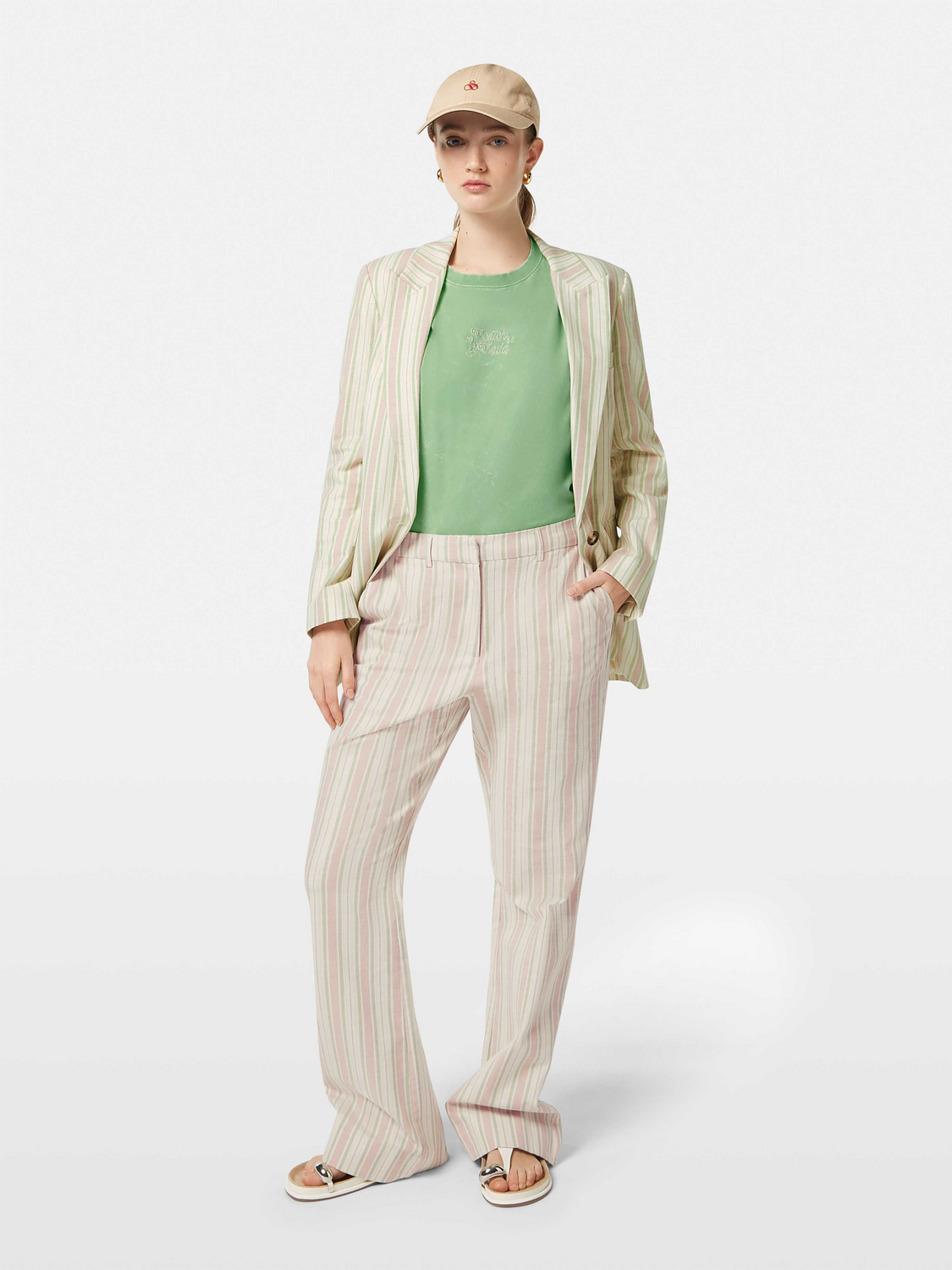 Lurex striped pants by Scotch & Soda featuring metallic gold and black stripes, slim fit with a stylish, contemporary look.