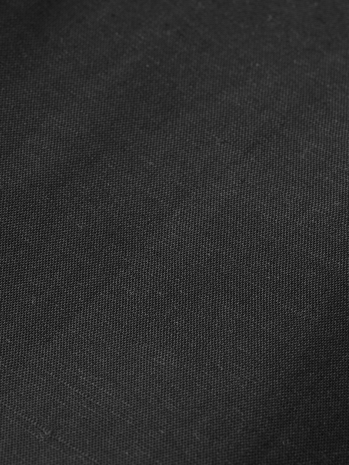 Scotch & Soda Quinn pleated pants in dark fabric, featuring a tailored fit and classic pleats, displayed on a neutral background.