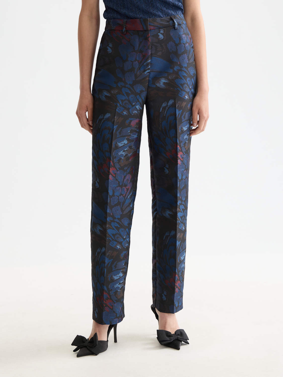 SCOTCH & SODA ripple jacquard pants featuring textured fabric, tailored fit, and stylish design on model.