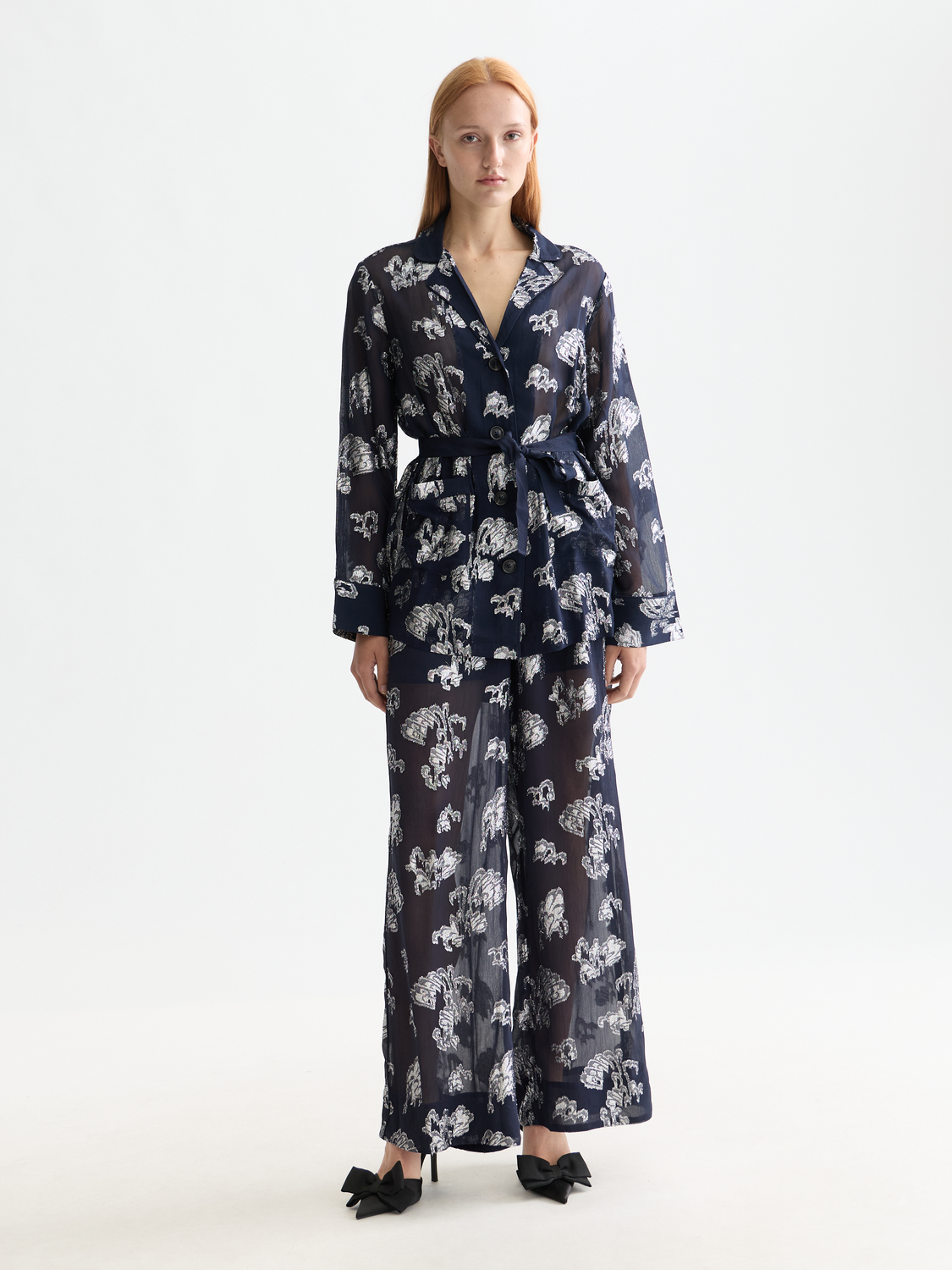 Eleni wide-fit pants by Scotch & Soda, featuring a relaxed fit and stylish design, shown in a neutral fabric and color.