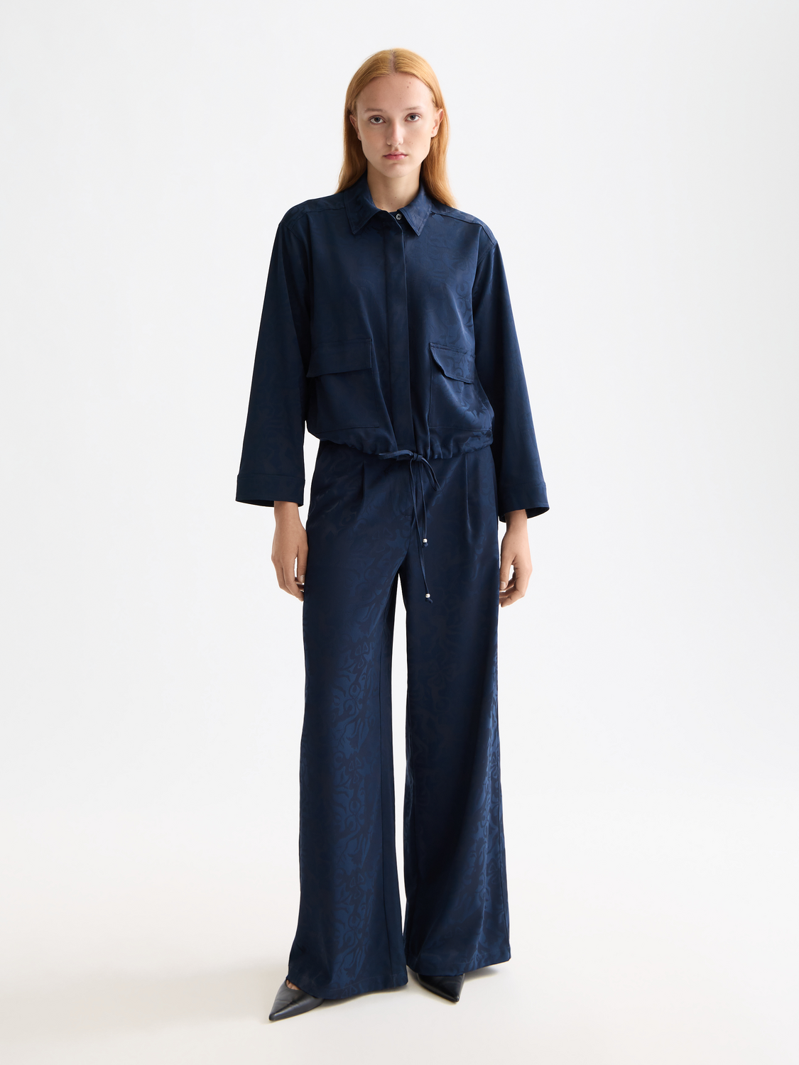 Eleni wide-fit pants by Scotch & Soda, featuring a relaxed fit and stylish design, shown in a front view.