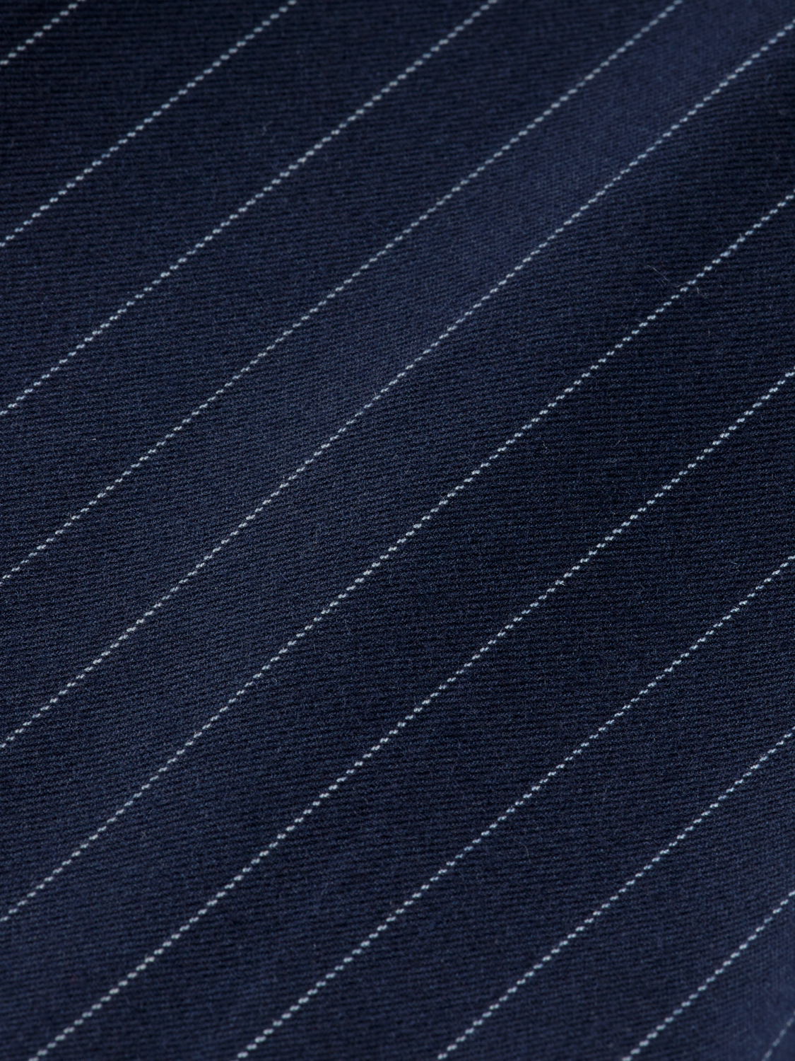 Slim-fit Lowry pants from Scotch & Soda in dark denim, featuring a classic five-pocket design and modern tapered fit.