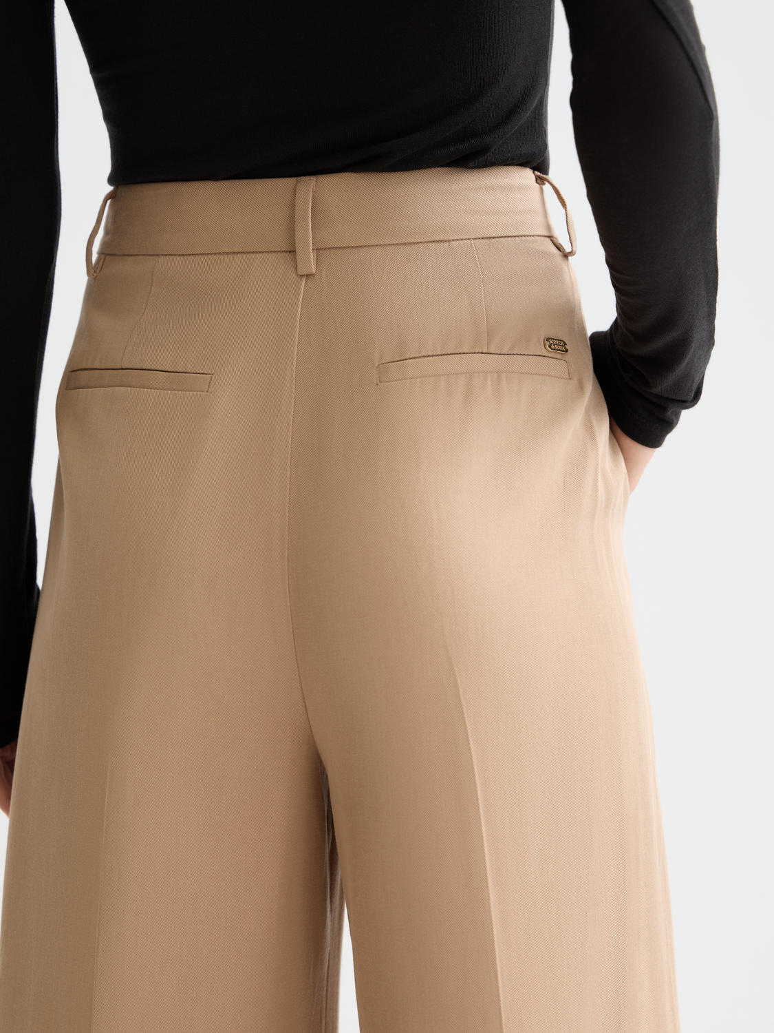 Wide-fit rose-colored pants by Scotch & Soda with a relaxed silhouette and stylish design.