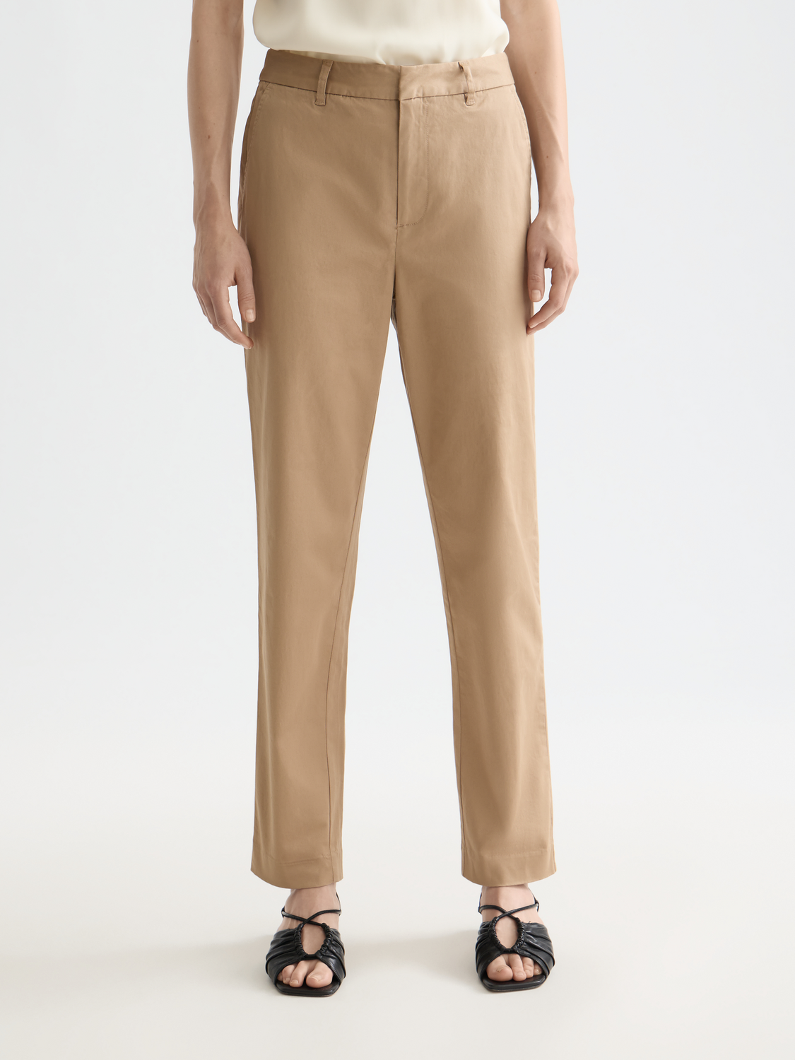Scotch & Soda Abbott tapered chinos pants in a neutral color, featuring a slim fit with front pockets and belt loops.