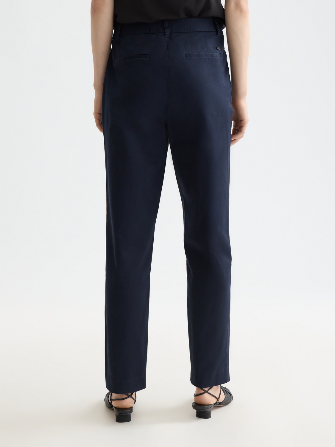Scotch & Soda Abbott tapered chinos pants in dark fabric, shown from the back with a clean, tailored fit.
