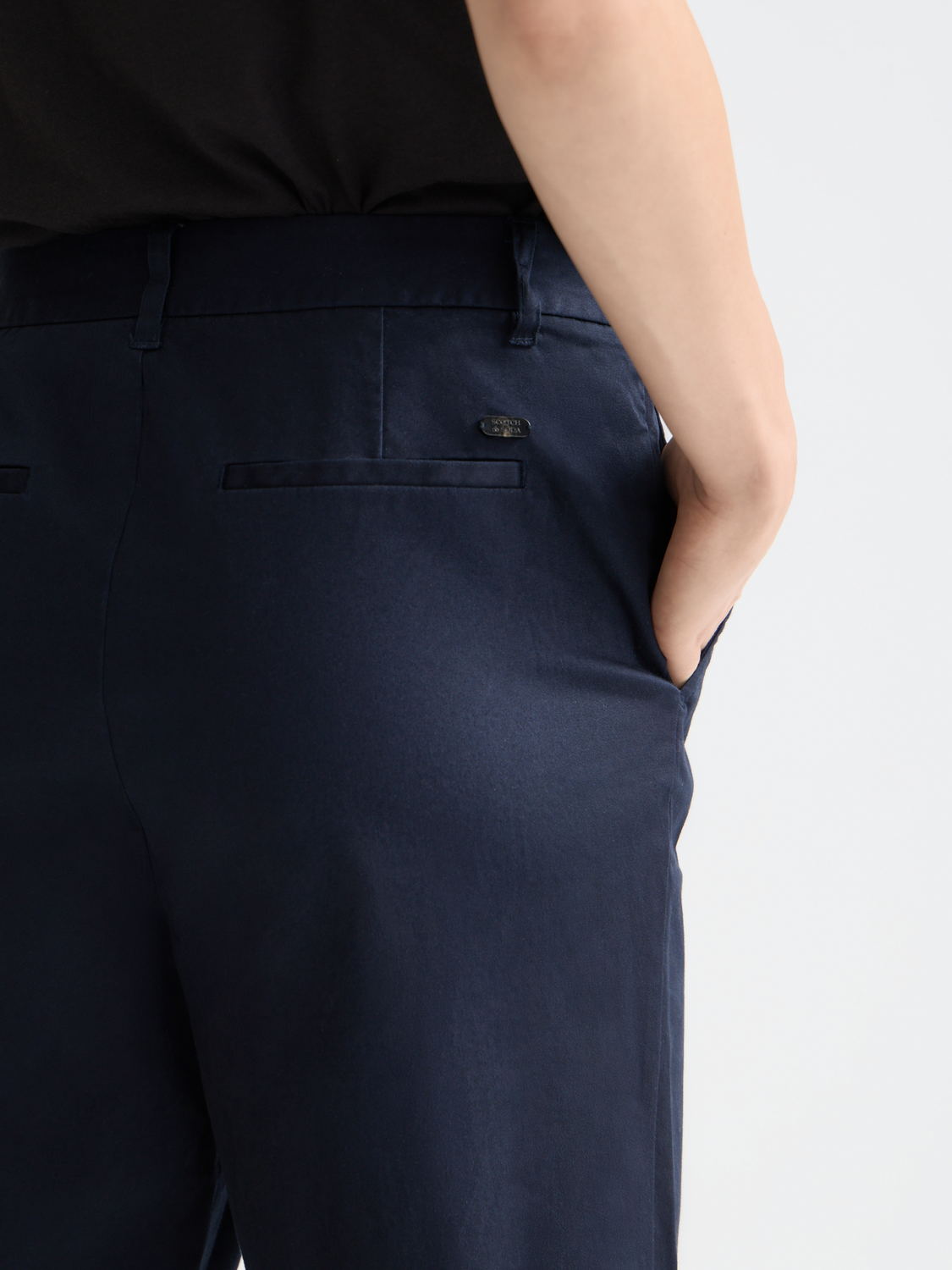 Scotch & Soda Abbott tapered chinos pants in a neutral color, featuring a slim fit and classic pocket design.