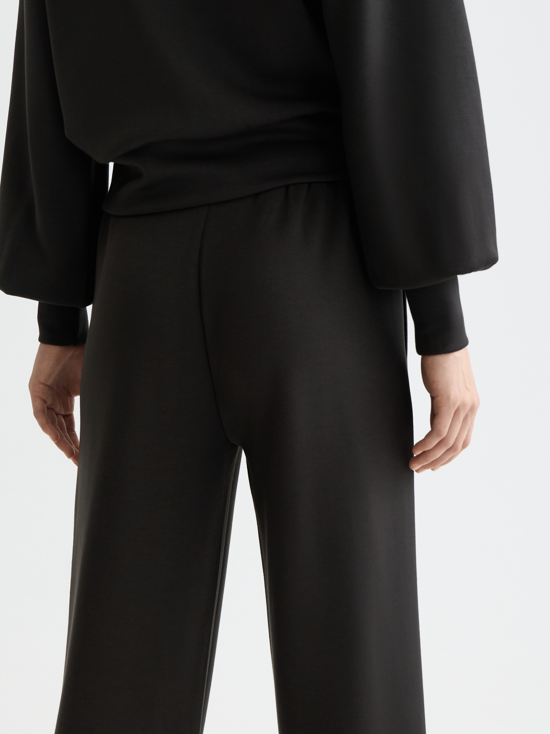 Light gray Scotch & Soda modal straight-fit sweatpants displayed flat with waistband and cuffs visible, soft and comfortable fabric.