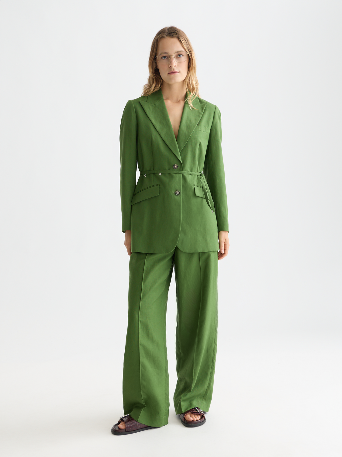 Wide-fit Lou pants by Scotch & Soda, shown in a relaxed fit with a mid-rise waist and casual style.
