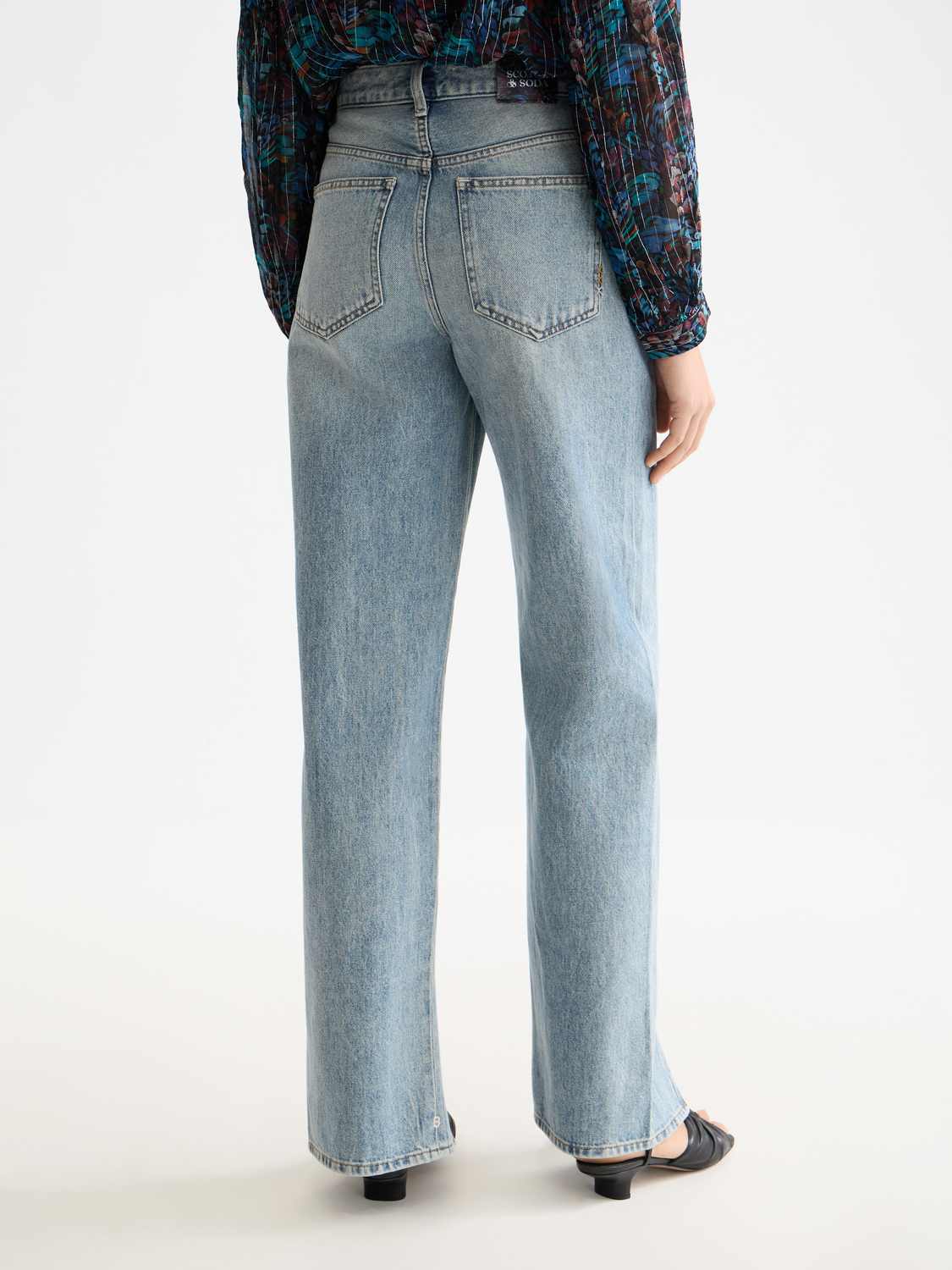Blue Scotch & Soda ripple straight-fit denim jeans with classic five-pocket design and belt loops, shown from the back.