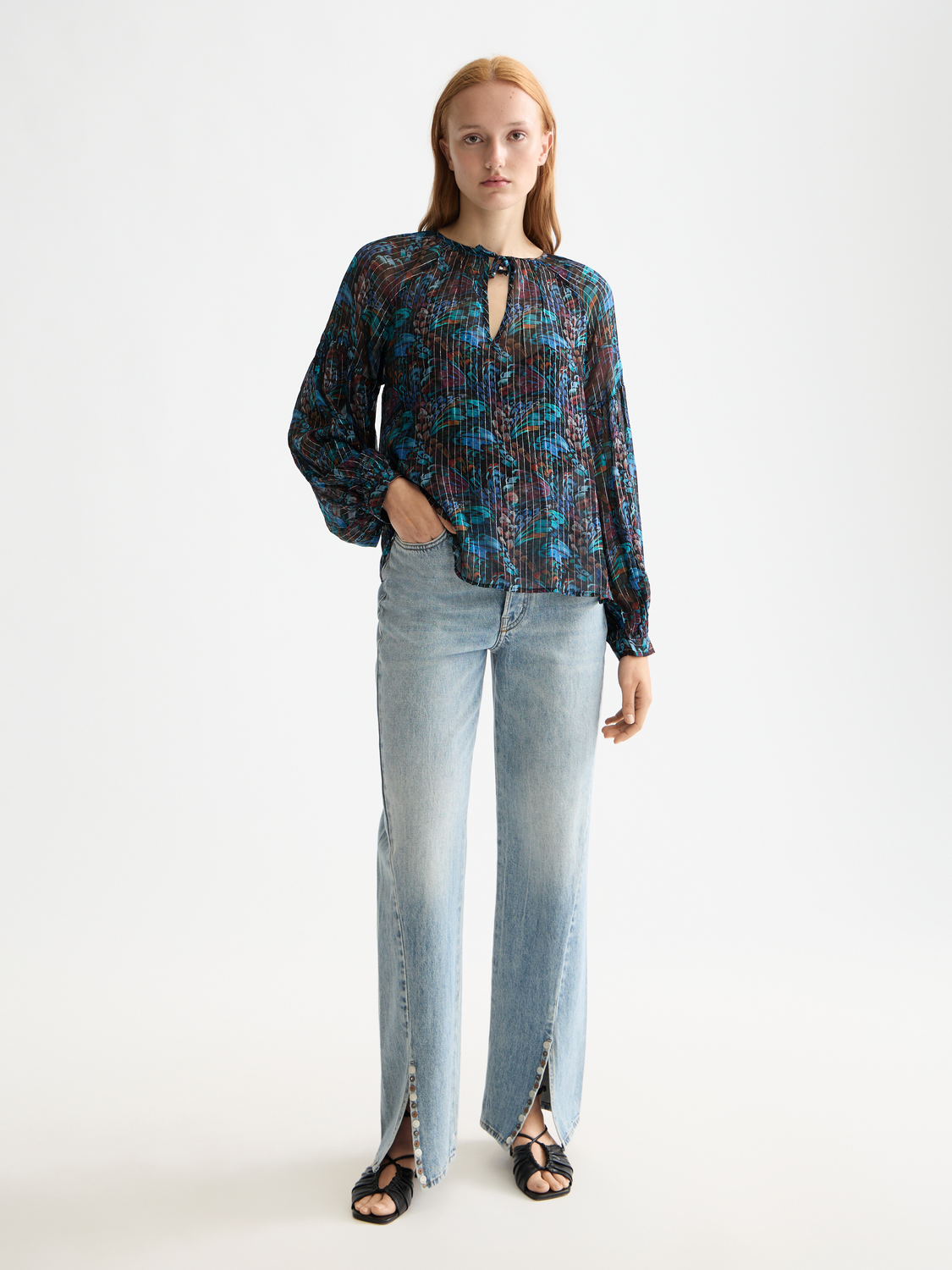 Scotch & Soda Ripple straight-fit denim jeans displayed on a mannequin, showcasing classic blue denim and straight-leg cut.