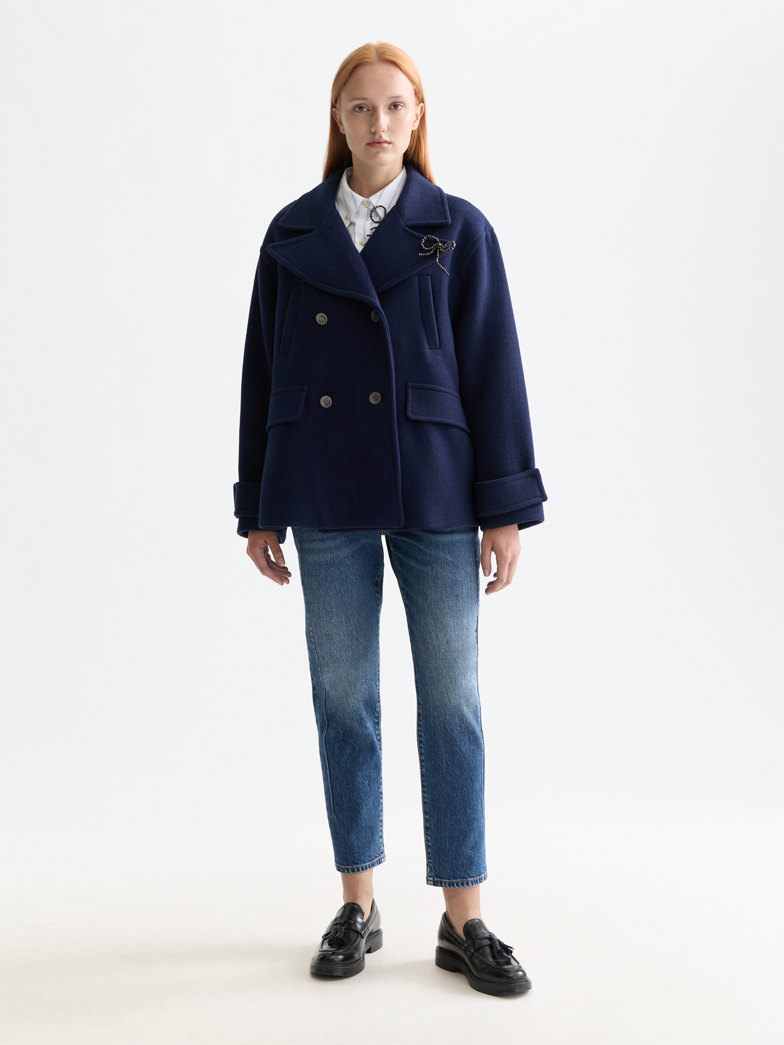 Scotch & Soda Buzz boyfriend-fit denim jeans shown in a front view, featuring classic five-pocket design and medium wash.