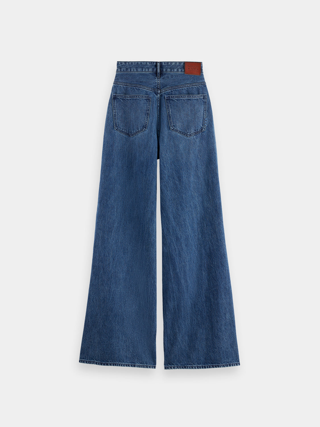 Wide-fit denim jeans by Scotch & Soda featuring a classic wave design, shown from the back in the image.