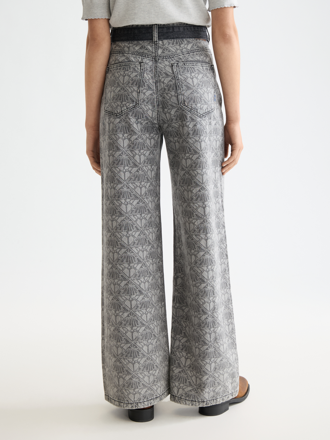 Blue Scotch & Soda Wave wide-fit denim jeans displayed from the back with classic five-pocket design and faded wash.