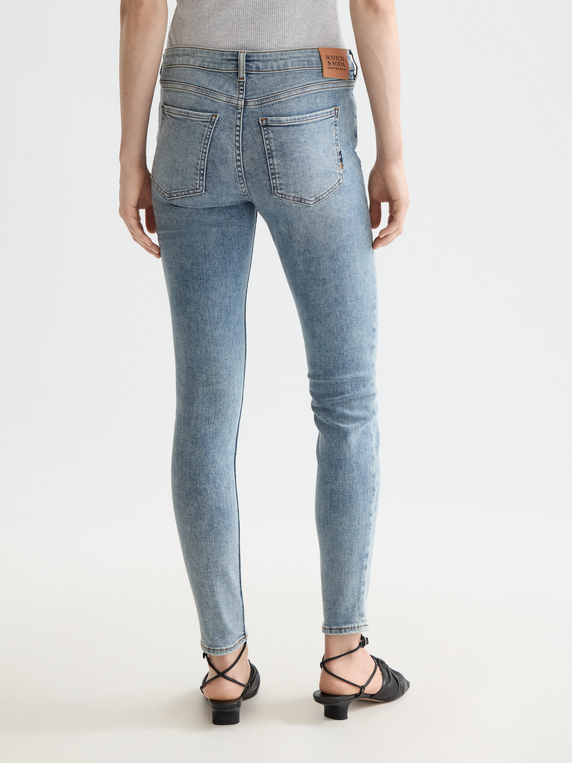Scotch & Soda Bohemienne skinny-fit denim jeans with back pocket stitching, shown from the rear view.