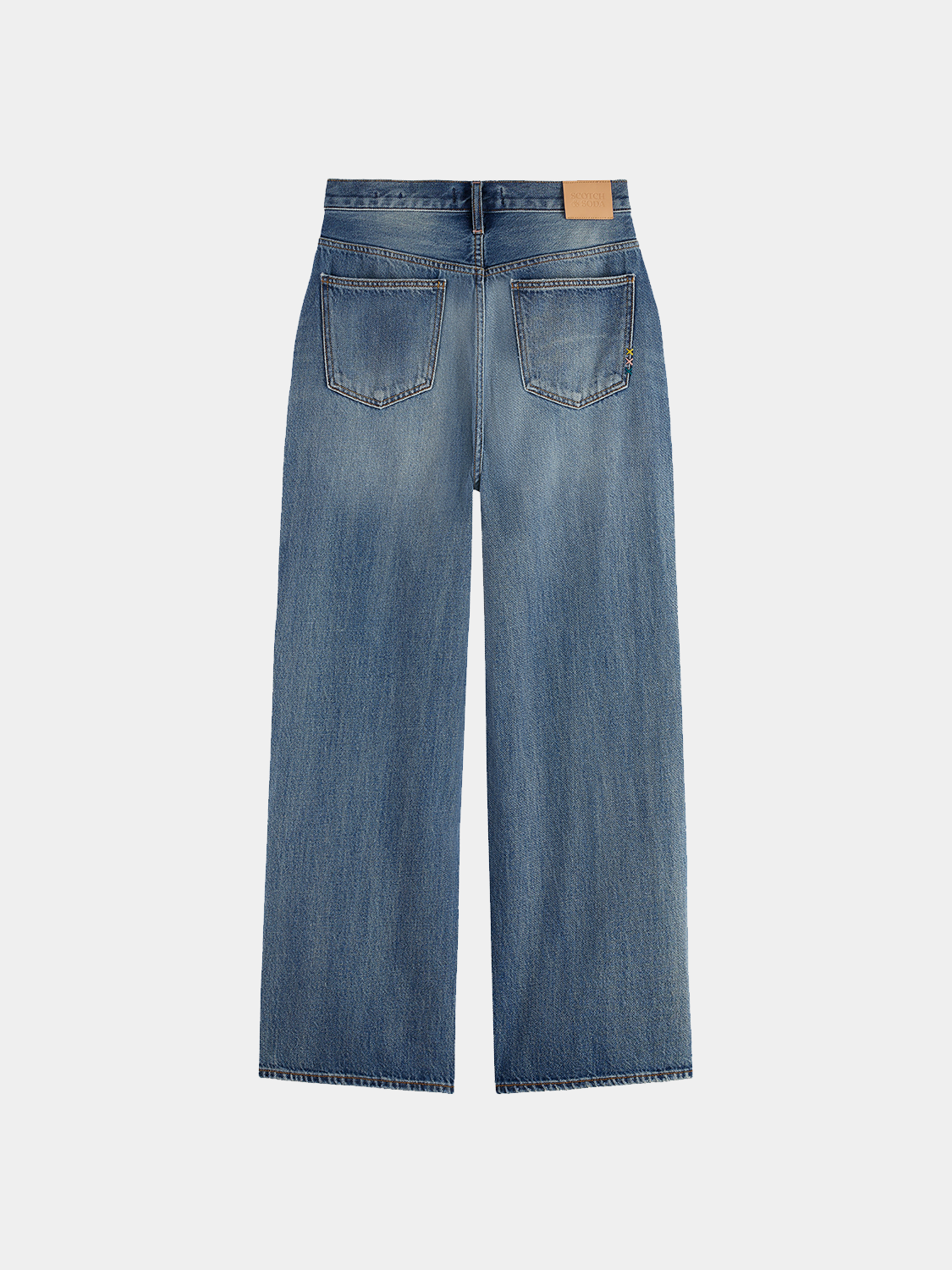 Deep loose-fit denim jeans by Scotch & Soda, showing dark blue color and relaxed fit with classic five-pocket design.