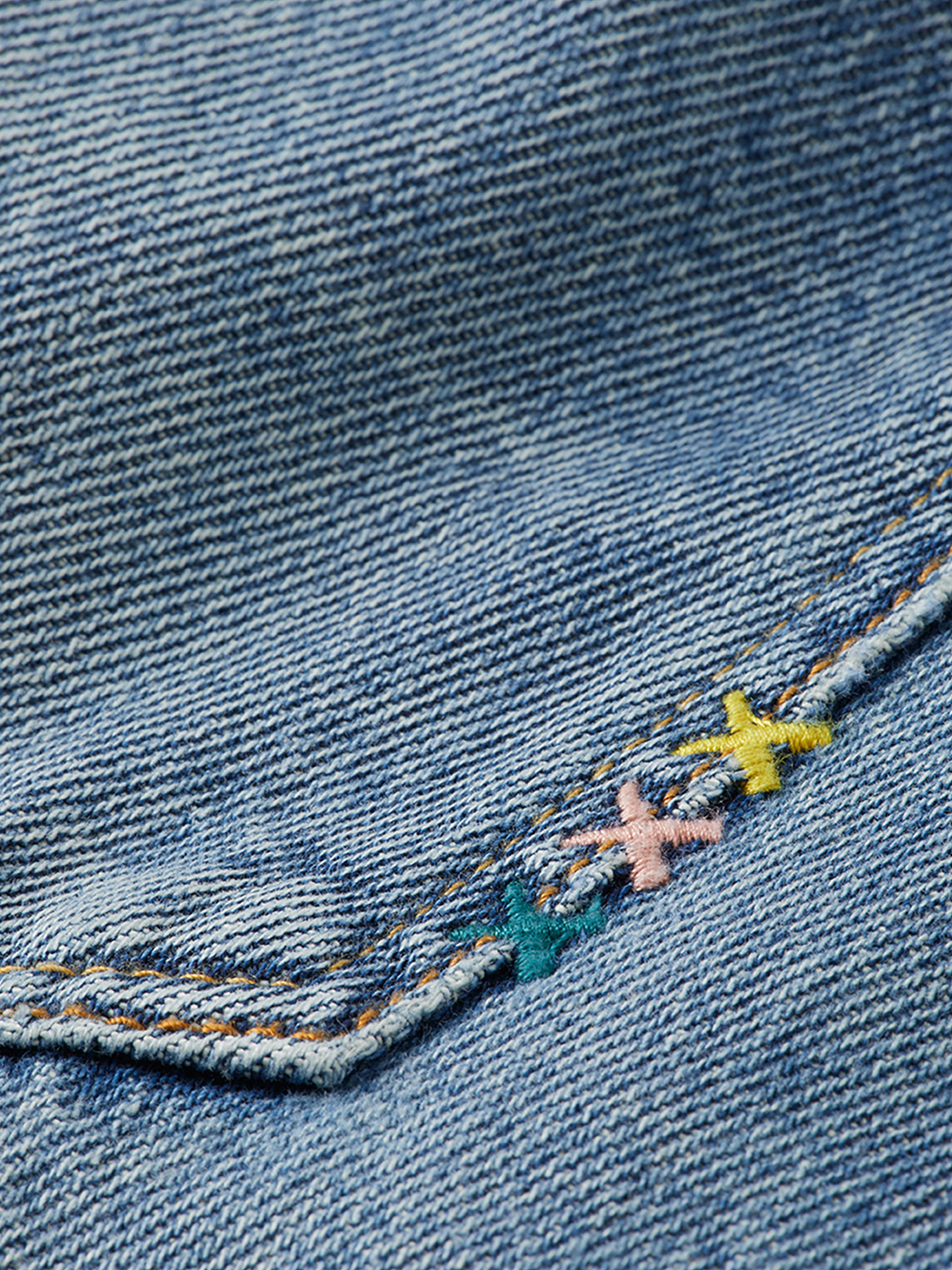 Deep loose-fit denim jeans by Scotch & Soda with a relaxed style and classic blue wash, displayed on a plain background.