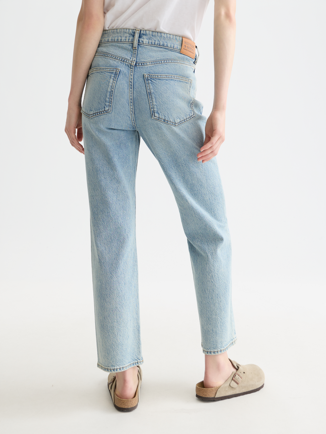 Sky straight-fit denim jeans by Scotch & Soda, back view showing classic blue color and clean stitching.