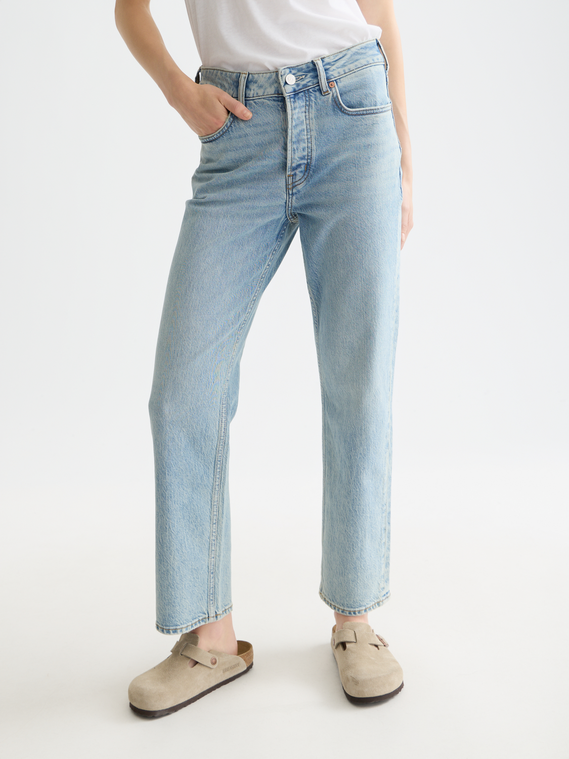 Sky straight-fit denim jeans by Scotch & Soda, displayed on a model showing front view with classic five-pocket style.