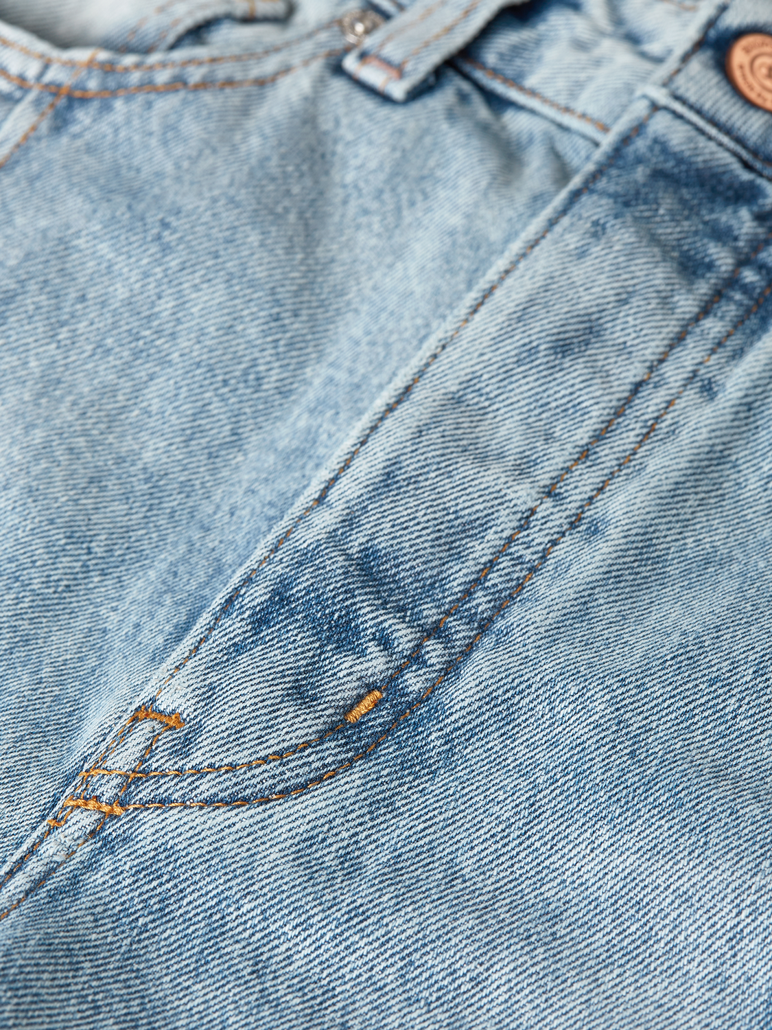 Wide-fit denim jeans by Scotch & Soda with a relaxed style, shown in a light blue wash with classic five-pocket design.