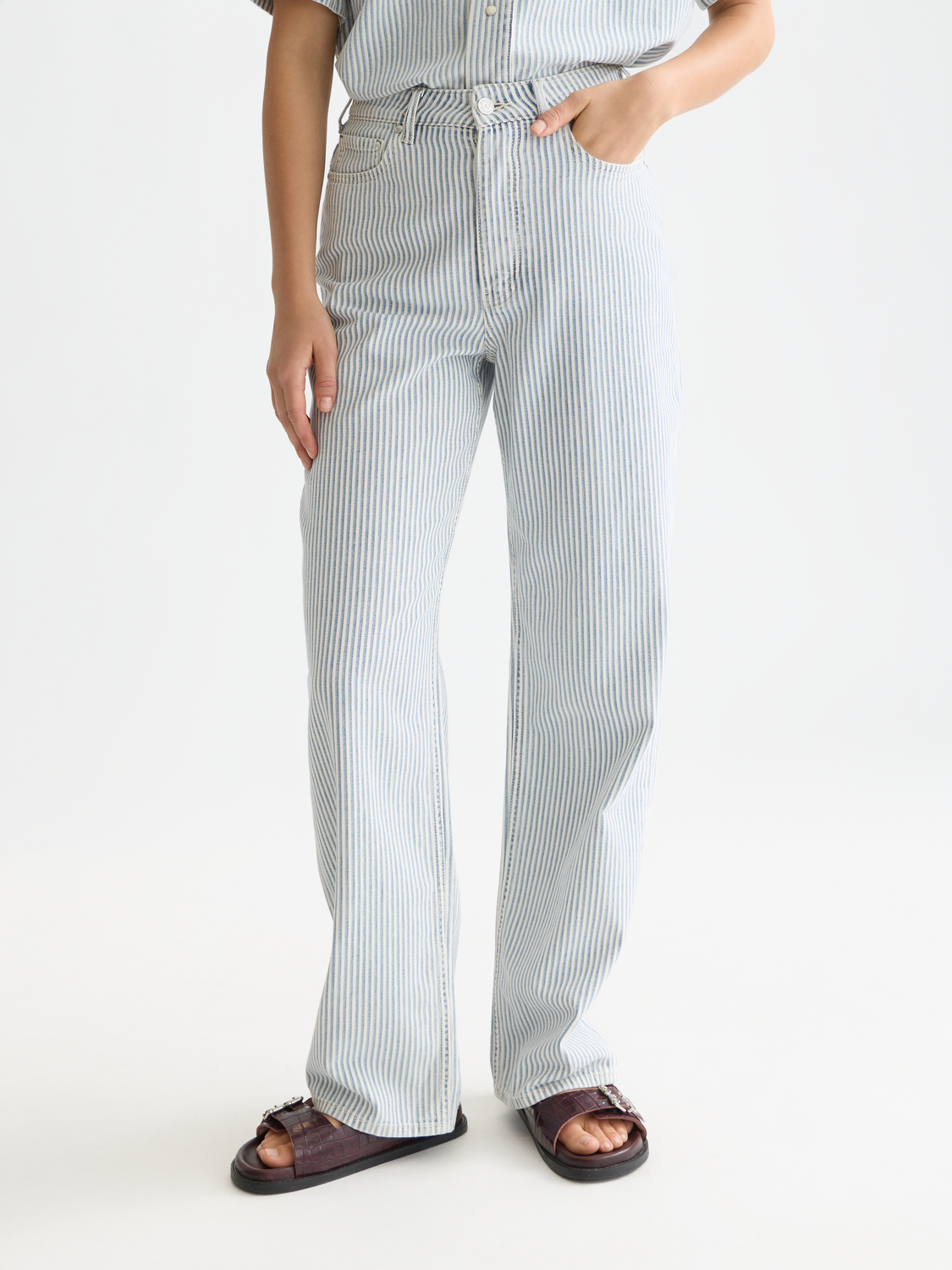 Ripple straight-fit denim jeans by Scotch & Soda displayed on a model, featuring classic five-pocket design and a dark wash.