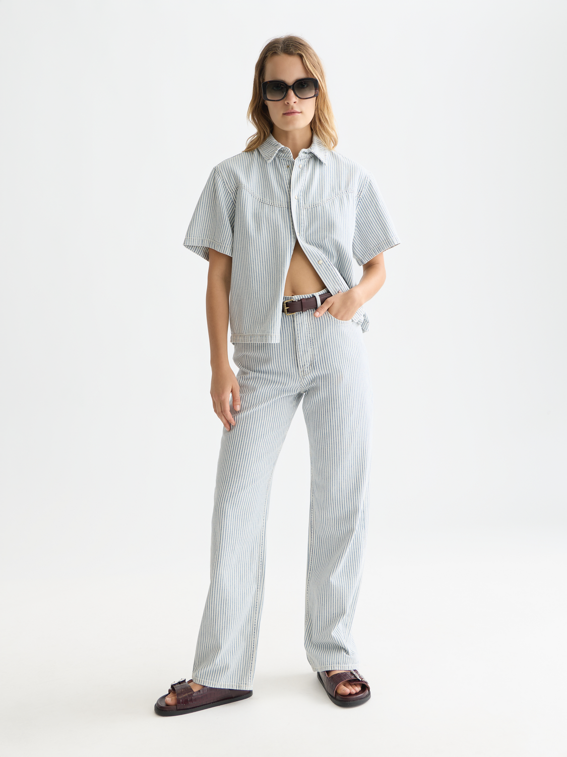 Scotch & Soda Ripple straight-fit denim jeans displayed on a model, showcasing classic five-pocket design and medium wash finish.