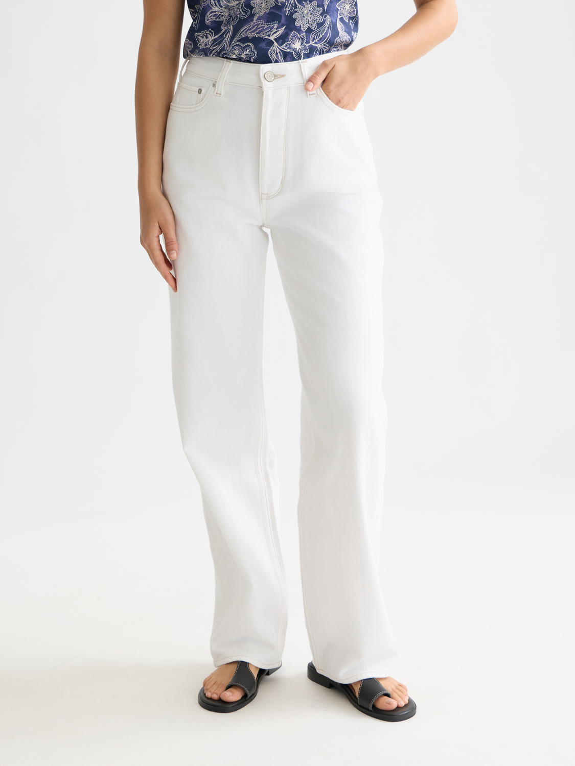 Ripple straight-fit denim jeans by Scotch & Soda, front view showing classic five-pocket design and light wash finish.