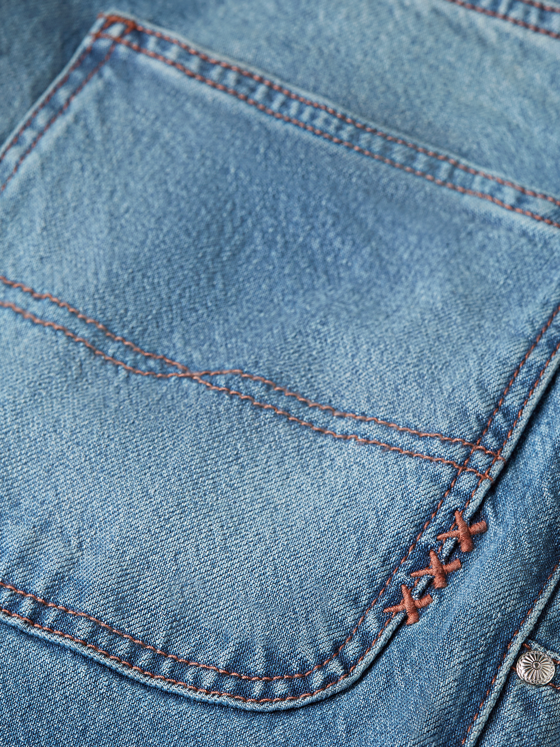 Raine wide-fit denim jeans by Scotch & Soda, showing classic blue denim with relaxed fit and stylish stitching details.
