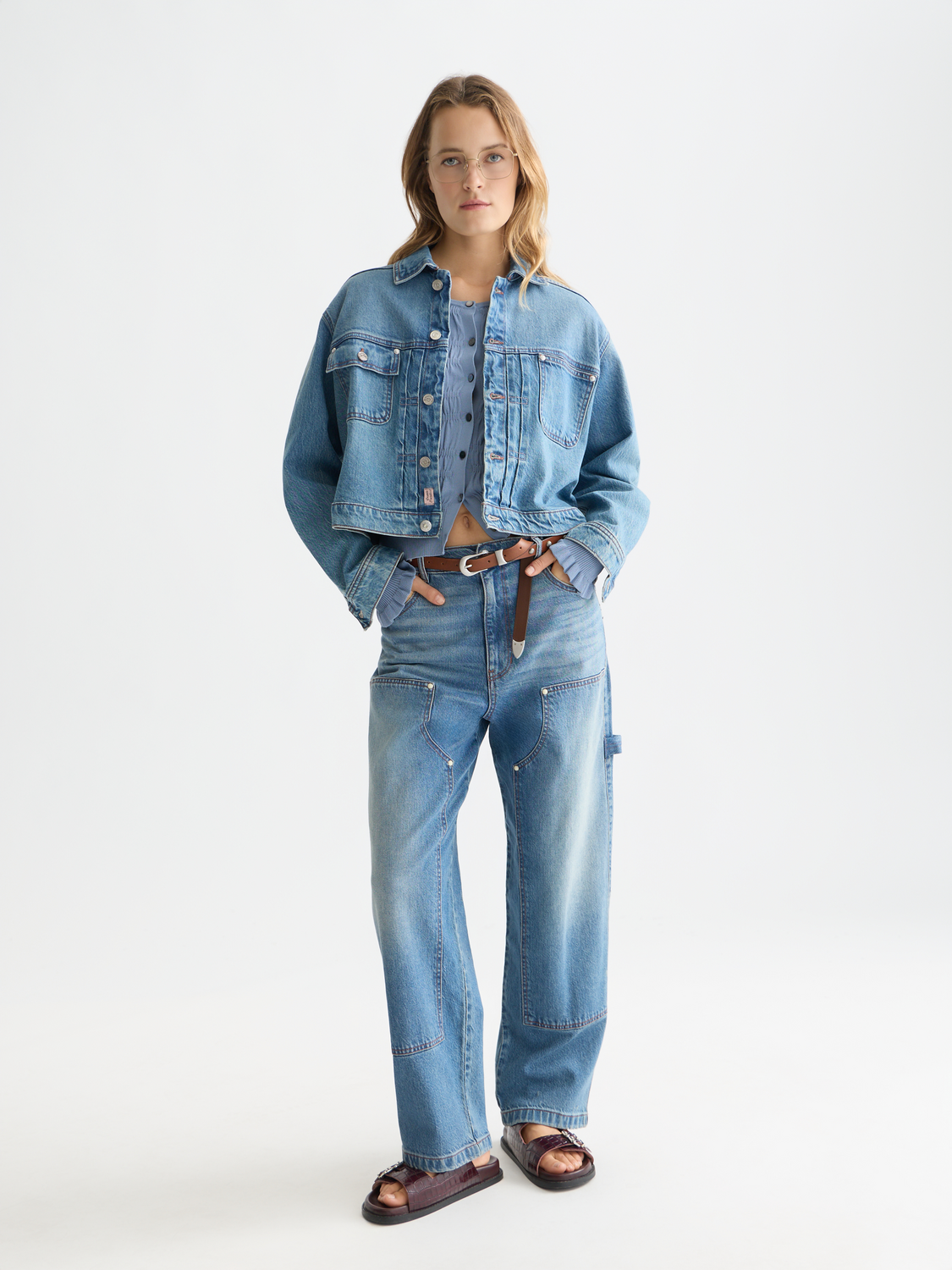 Scotch & Soda Raine wide-fit denim jeans displayed on a model, showing their relaxed fit and classic blue wash.