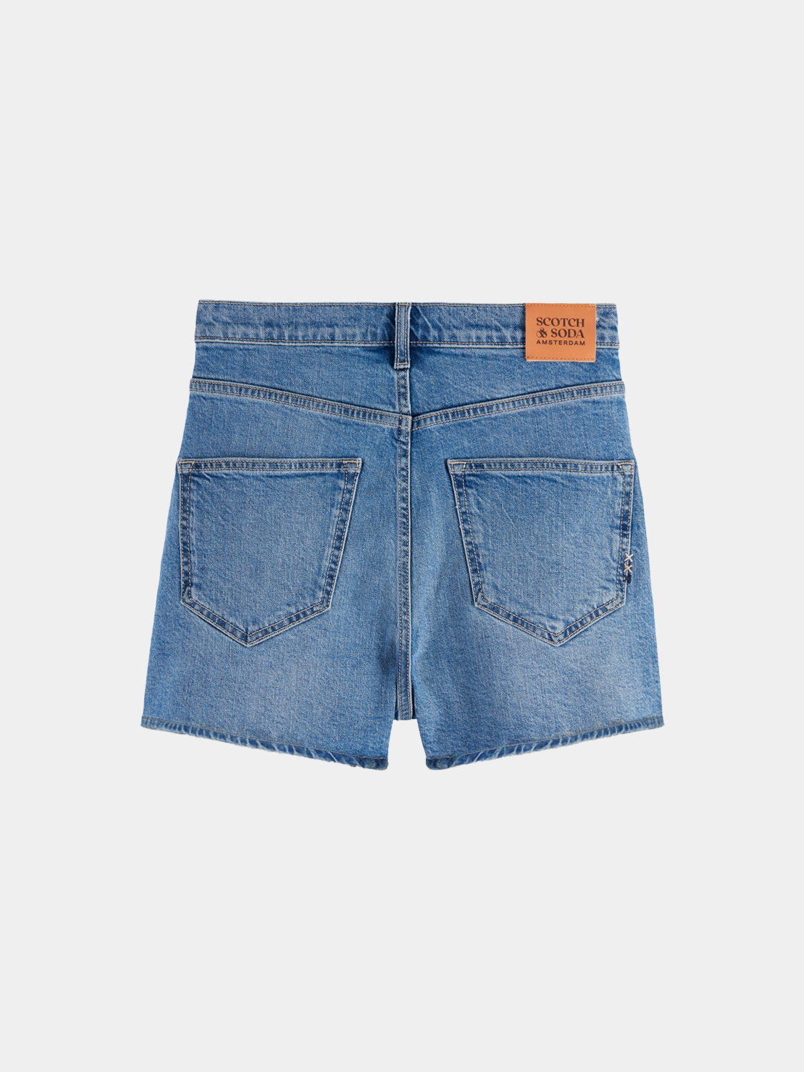 Back view of Scotch & Soda Ray denim shorts with distressed details and frayed hems, made from classic blue denim fabric.