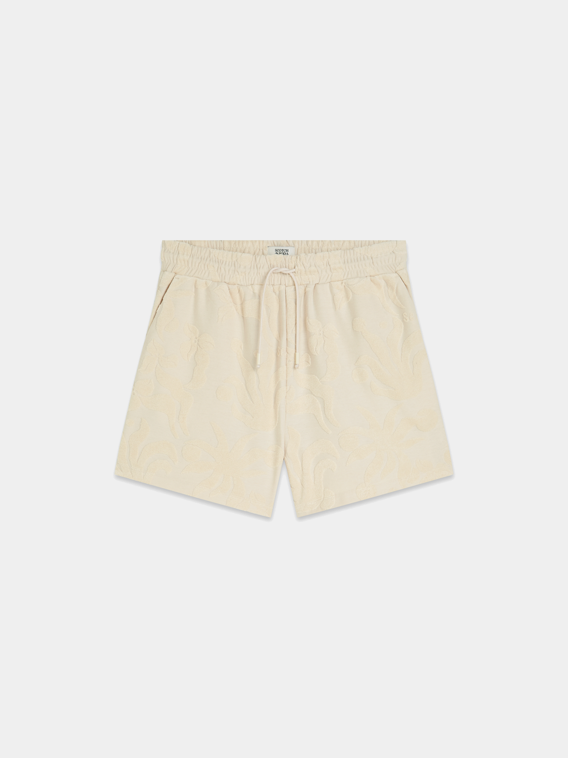 Light beige Scotch & Soda towelling shorts with an elastic waistband and side pockets, displayed on a neutral background.
