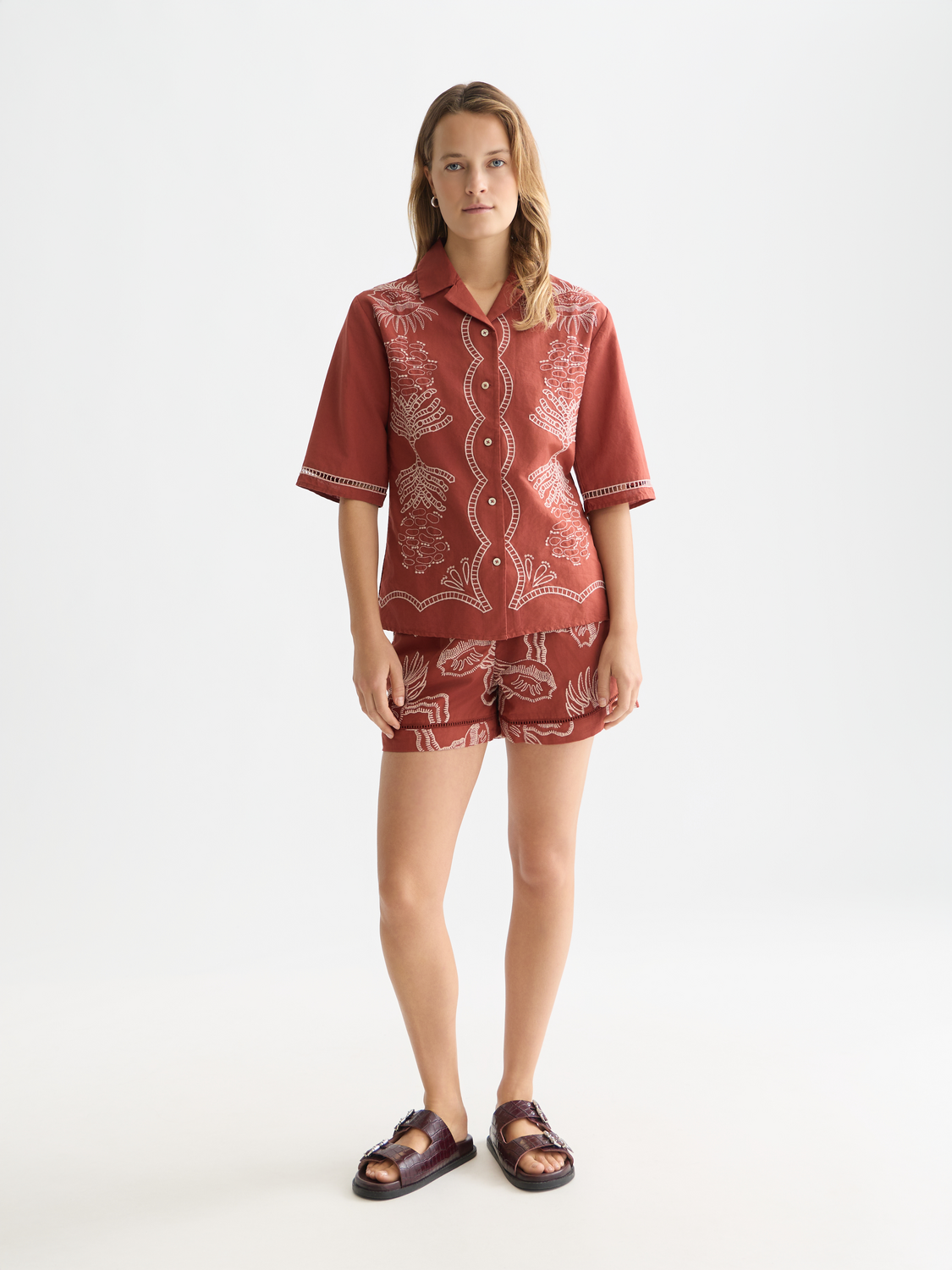 Embroidered shorts by Scotch & Soda featuring intricate floral embroidery, casual fit, and lightweight fabric for summer wear.